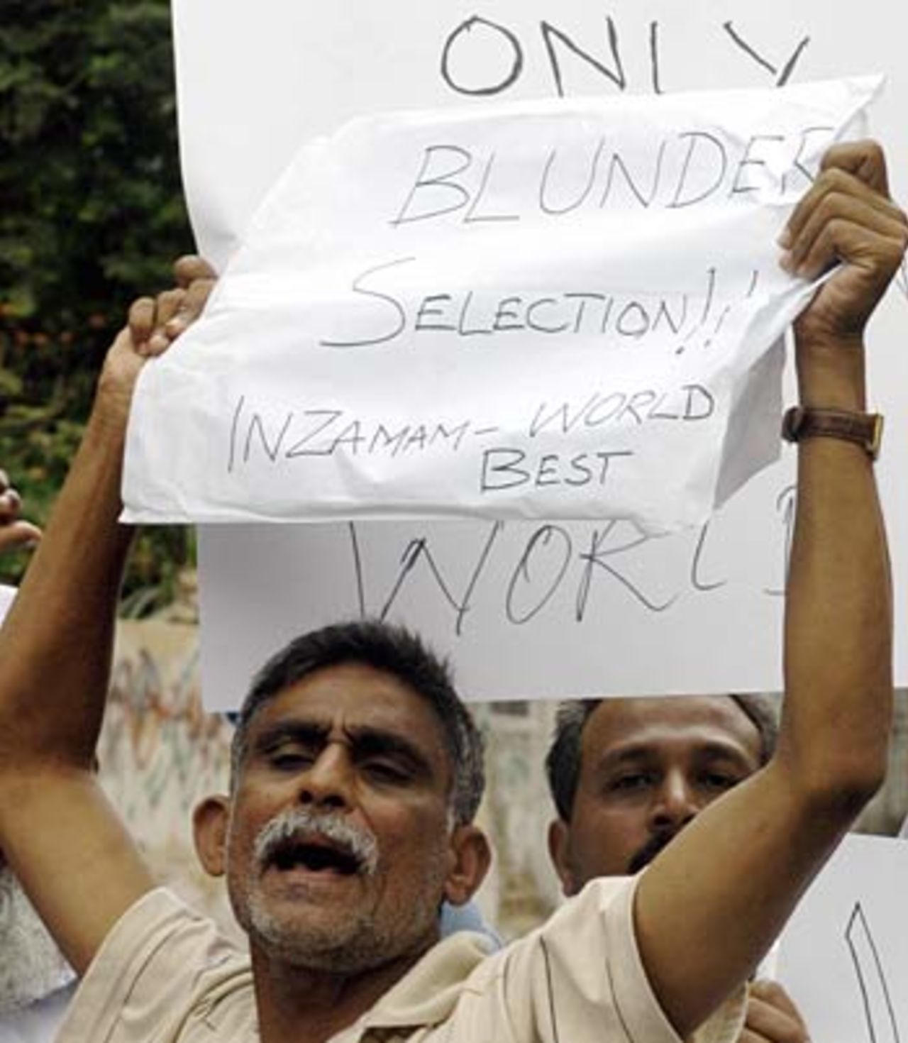 Angry Pakistani cricket fans chant anti-ICC slogans after Inzamam-ul-Haq was left out of the Rest of the World XI, Karachi, August 25, 2005