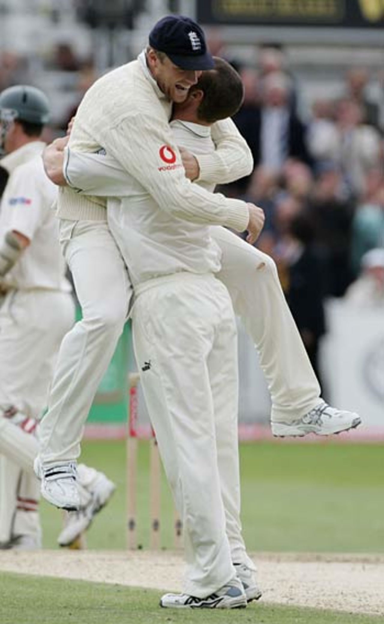 Andrew Flintoff embraces five-wicket hero Simon Jones , England v Australia, 4th Test, Nottingham, August 27, 2005