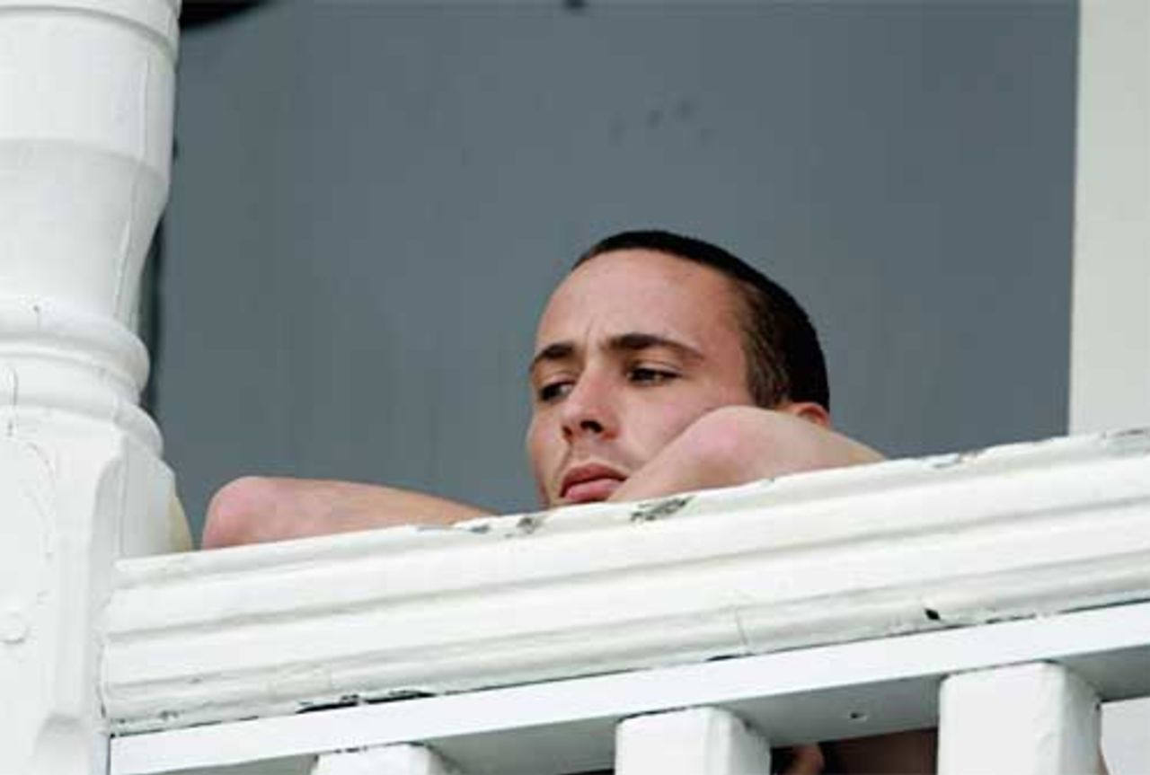 A gloomy Simon Jones watches from the balcony on the fourth morning after an ankle injury ruled him out of the day's play, England v Australia, 4th Test, Trent Bridge, 28 August 2005