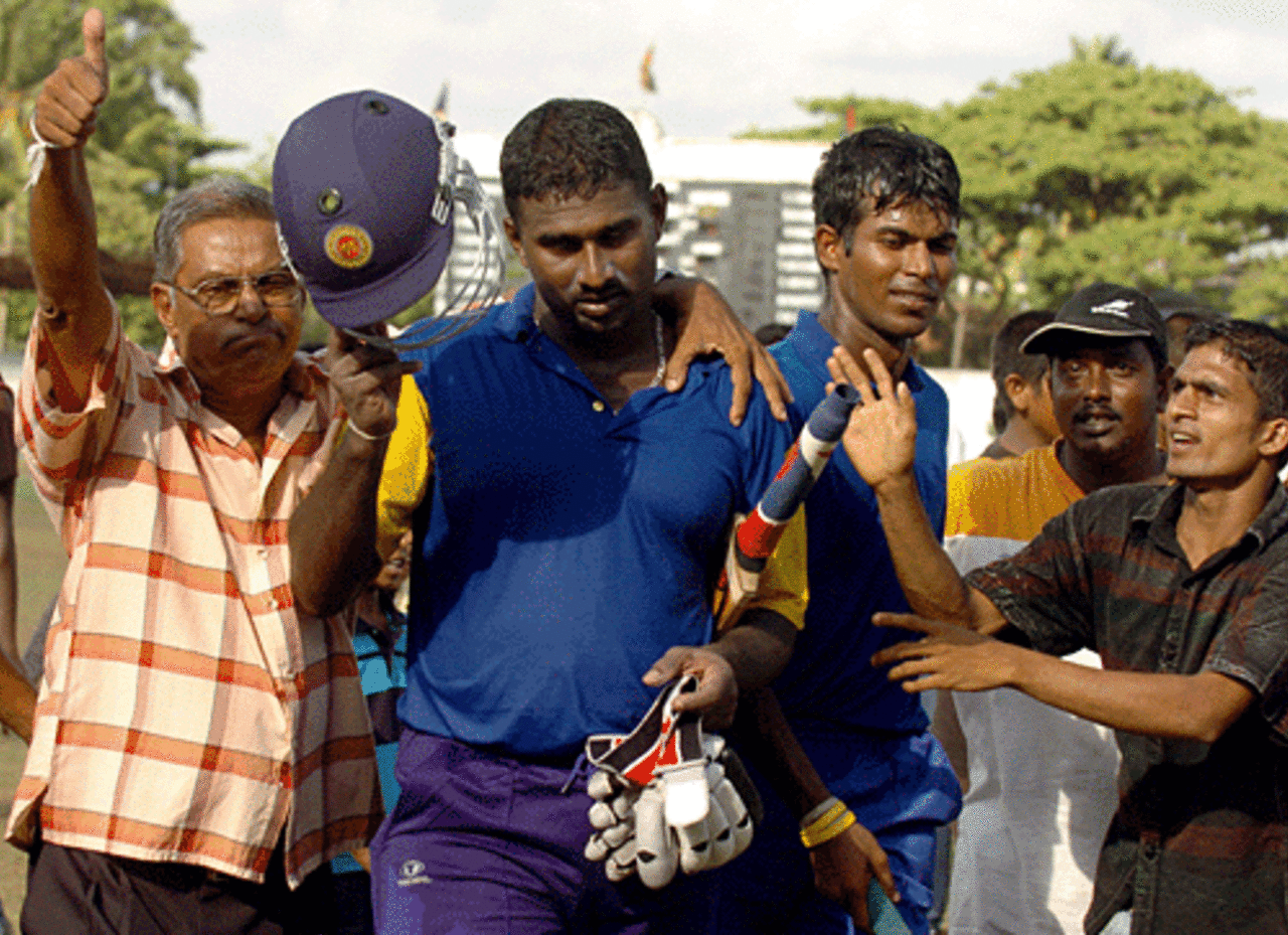 Avishka Gunawardene and Upul Tharanga are mobbed by fans after beating Bangladesh by 10 wickets, Sri Lanka Cricket XI v Bangladesh, Moratuwa, August 28, 2005