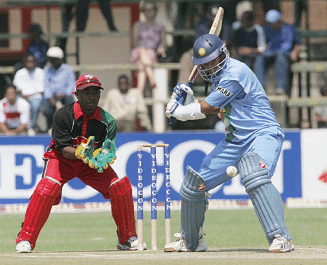 Rahul Dravid lines up for a cut but eventually the balls crashes into leg stump, Zimbabwe v India, Harare, August 29, 2005