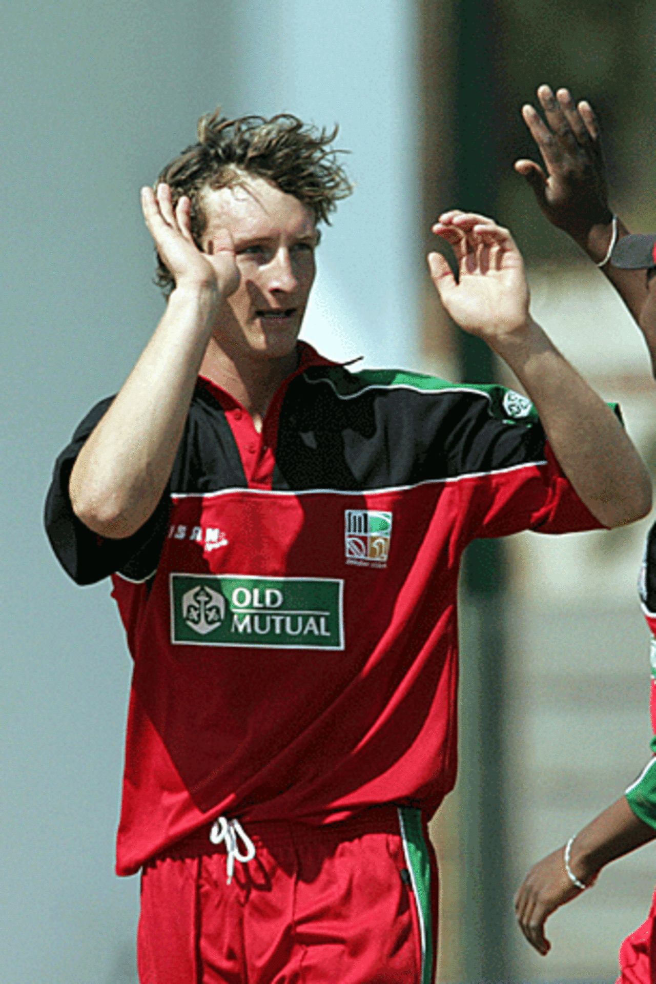 Anthony Ireland celebrates after taking Stephen Fleming's wicket, Zimbabwe v New Zealand, Harare, August 31, 2005