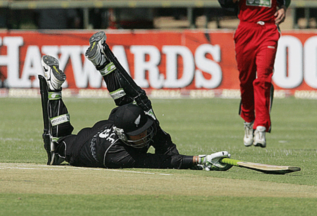 Nathan Astle dives desperately to make his ground, Zimbabwe v New Zealand, Harare, August 31, 2005