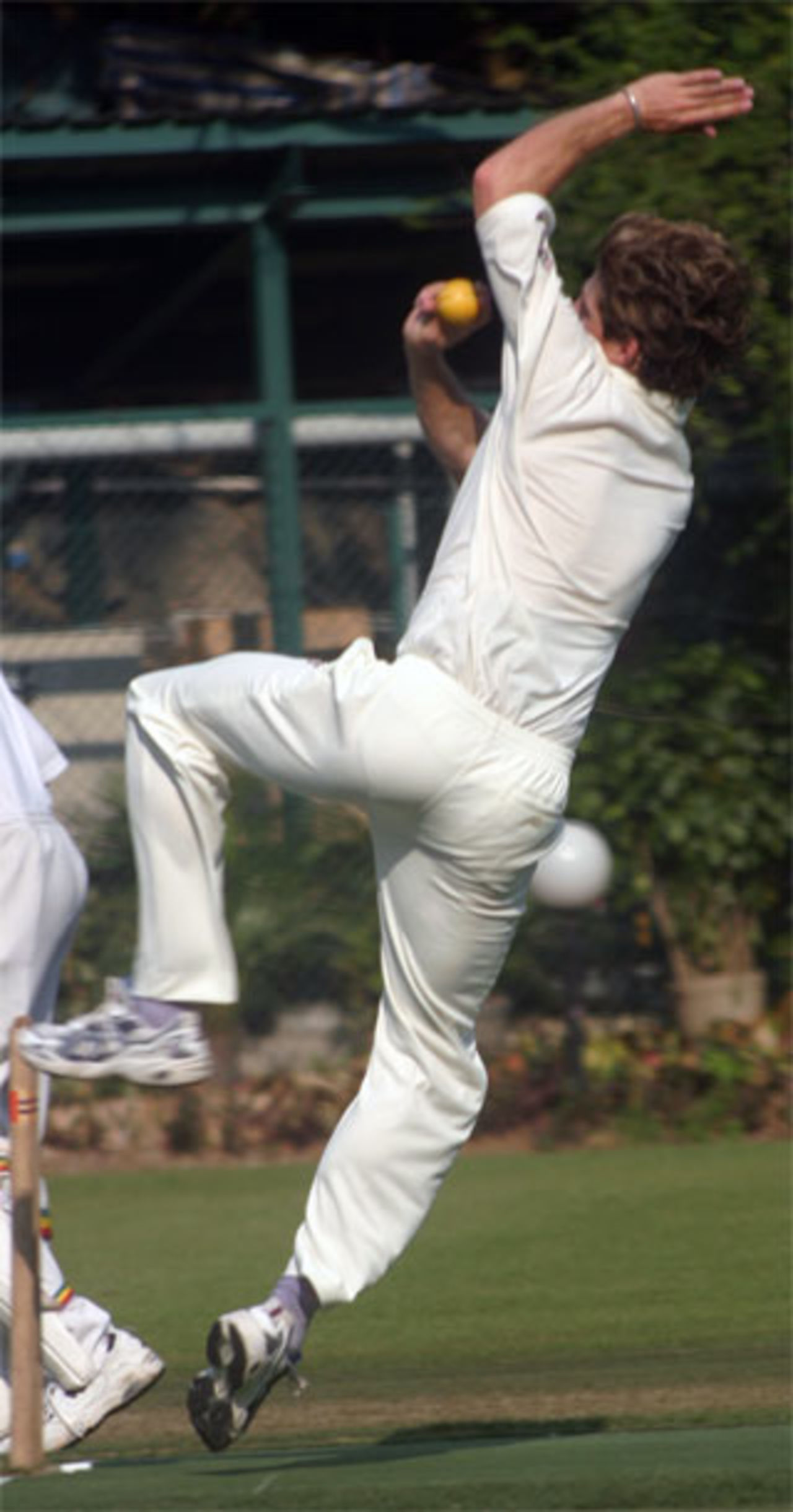 Ryan Eagleson bowling for Gap Ramblers at Kowloon Cricket Club during the 2003-04 season