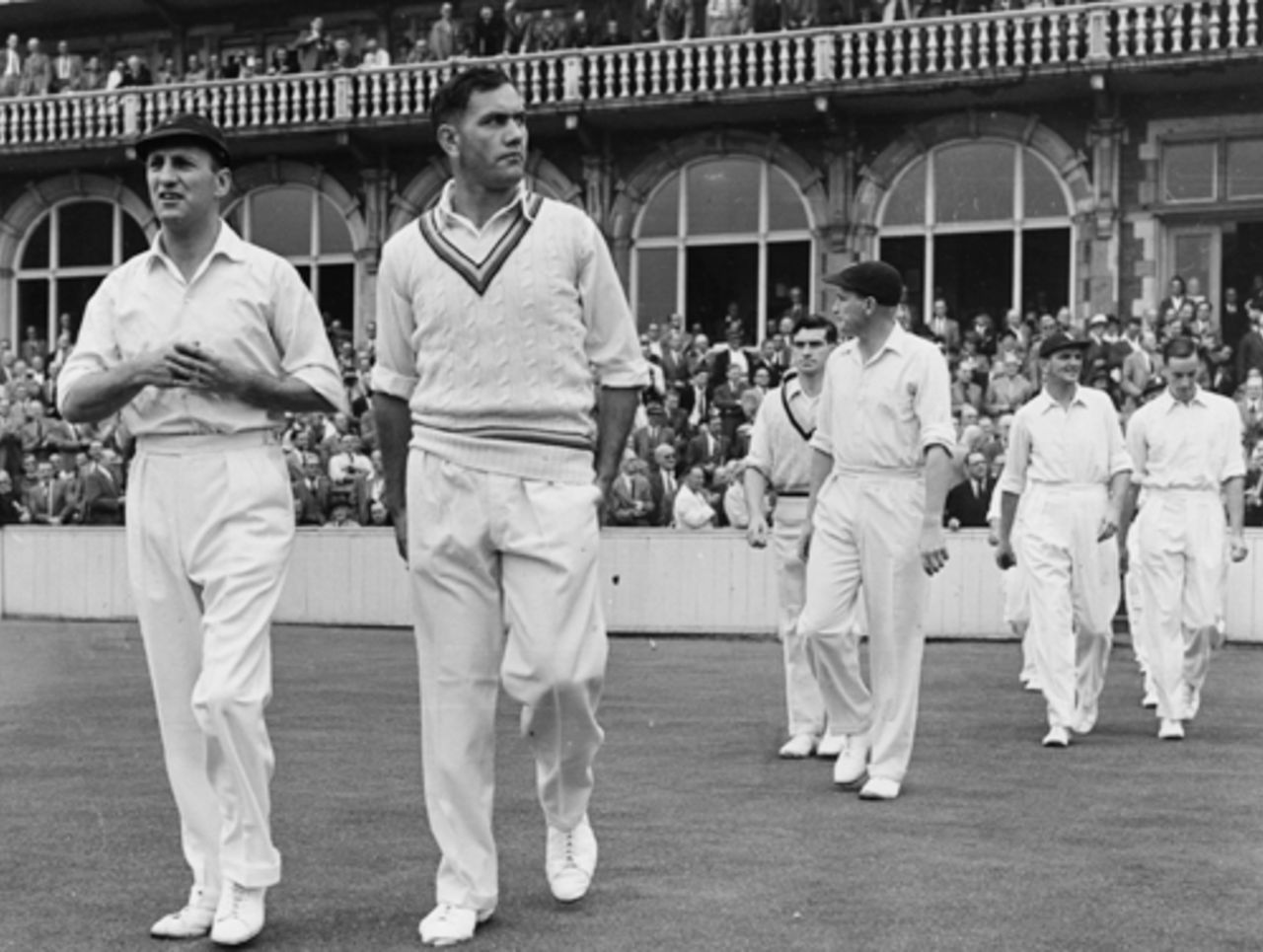 Len Hutton and Alec Bedser lead England onto the field for the fifth Test at The Oval with the Ashes at stake, England v Australia, The Oval, August 1953