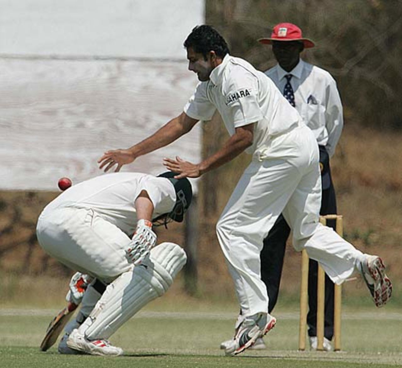 Anil Kumble attempts a catch off the back of Terrence Duffin, Zimbabwe A v Indians, Mutare, September 8, 2005