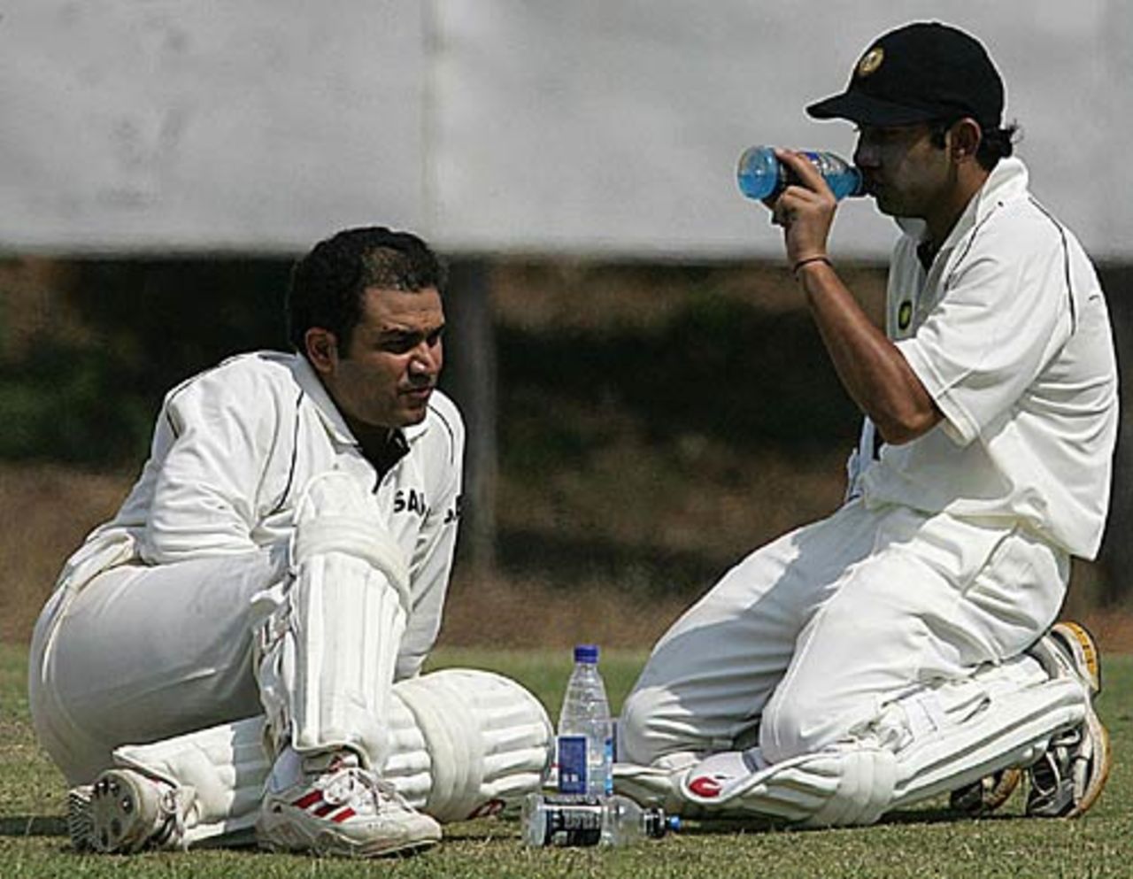 Virender Sehwag and Gautam Gambhir take a break during their 196-run opening partnership, Zimbabwe Board XI v India, Mutare, September 9, 2005