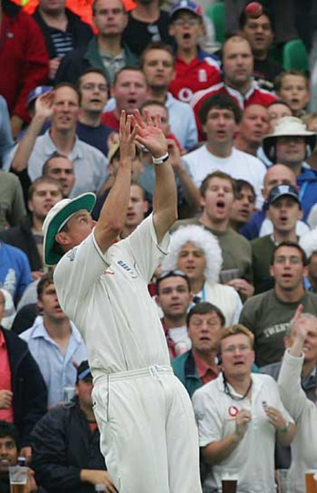 Don't drop it, Ashley! Ashley Giles reaches to take a good catch in the deep, watched by an expectant crowd, England v Australia, The Oval, September 11, 2005