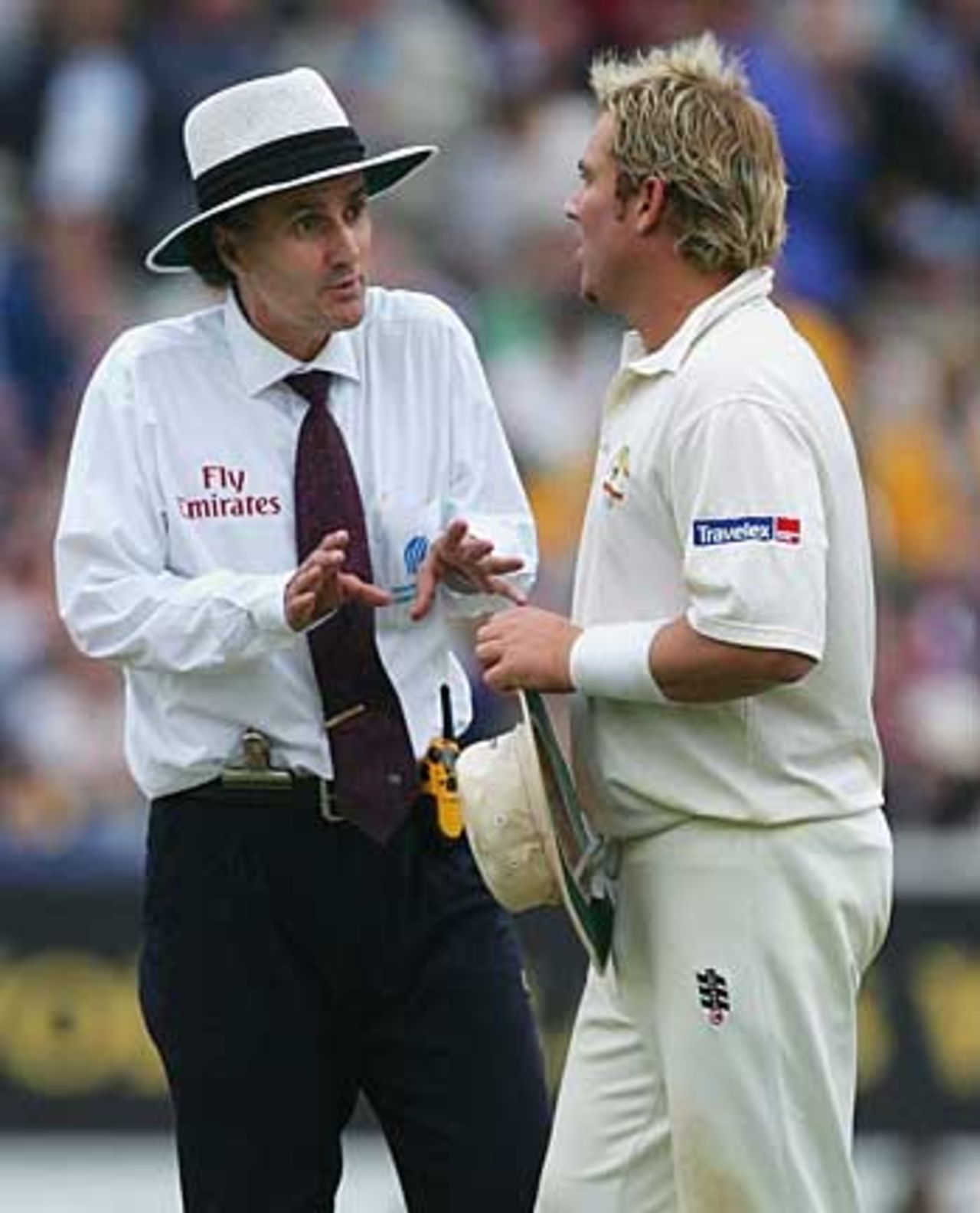Billy Bowden tries to explain the reason behind offering the batsmen the light, on a gloomy fourth day at The Oval, England v Australia, September 11, 2005