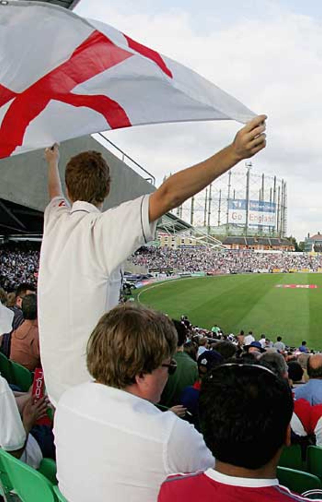 An England fan waves his flag as England draw with Australia, England v Australia, September 12, 2005