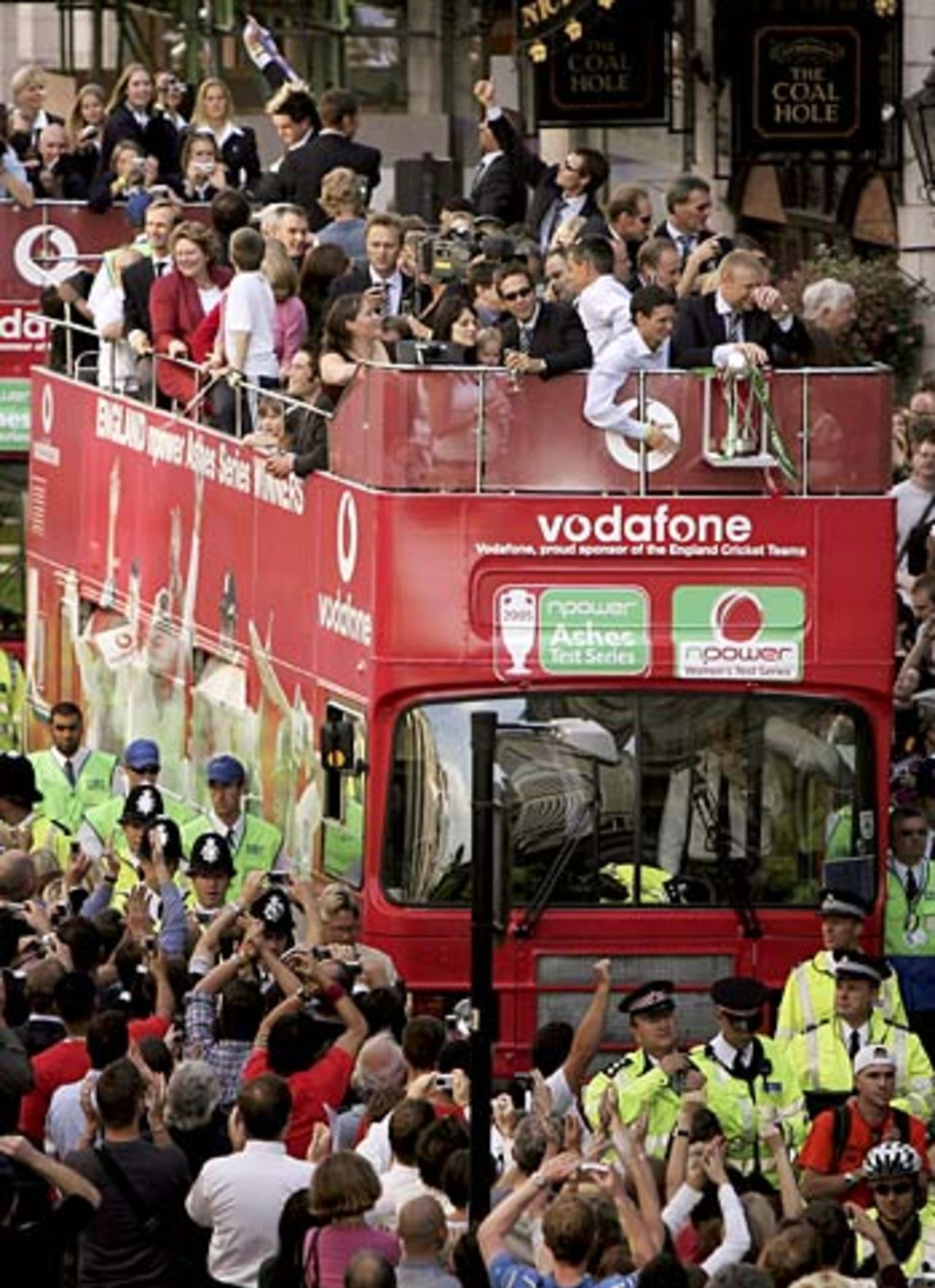 The bus carrying the England side crawls through London, London, September 13, 2005
