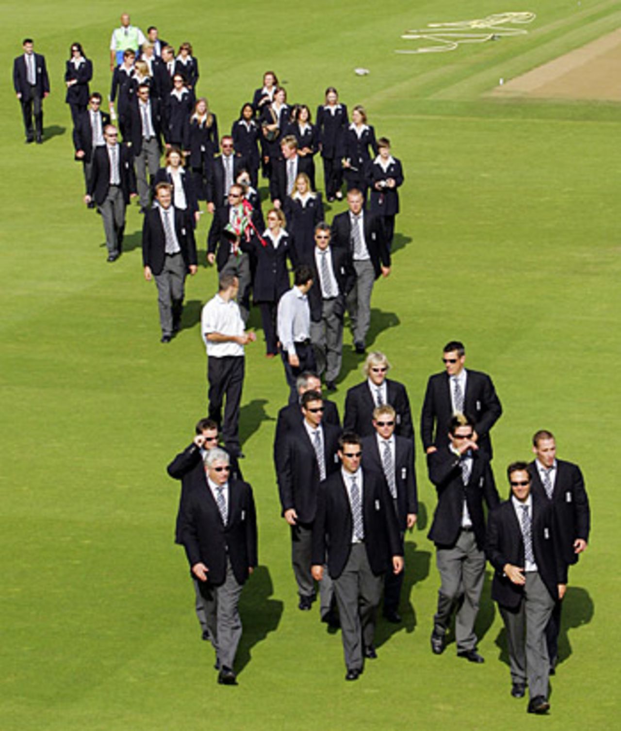 The England men and women's teams make their way to the Lord's pavilion, London,  September 13, 2005