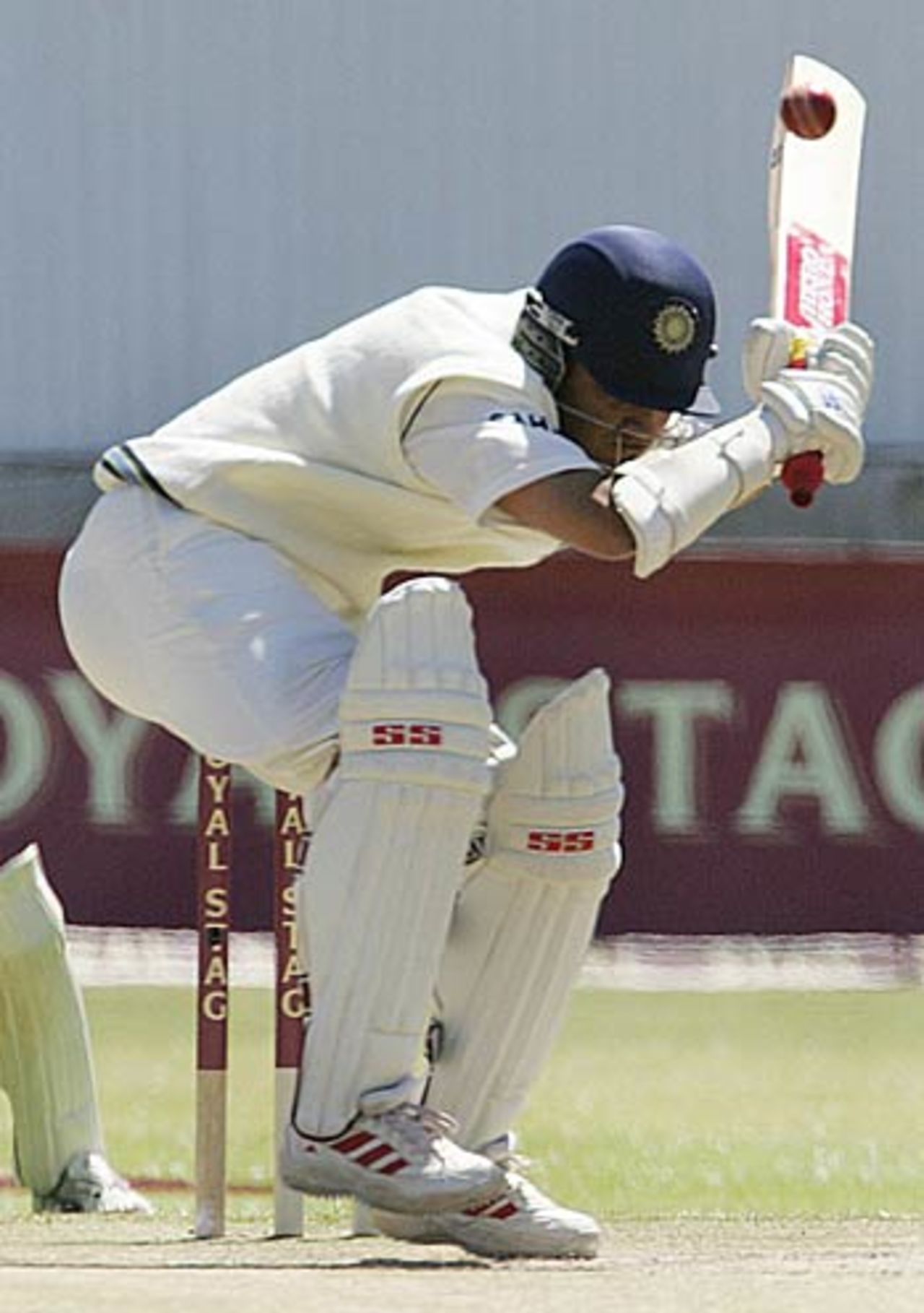 Sourav Ganguly's bat pokes out dangerously as he takes evasive action, Zimbabwe v India, 1st Test, Bulawayo, September 15, 2005