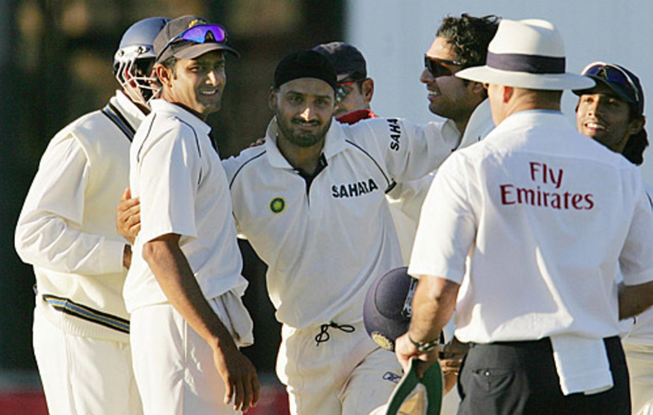 Harbhajan Singh is congratulated by teammates for taking his 200th Test wicket, India v Zimbabwe, Bulawayo, September 15, 2005