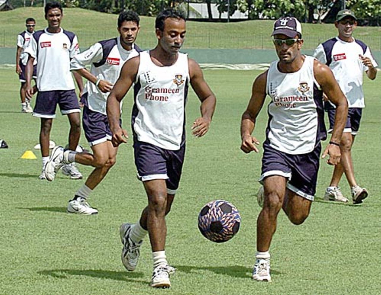 Khaled Mashud and Aftab Ahmed enjoy a game of football, Colombo, September 18, 2005