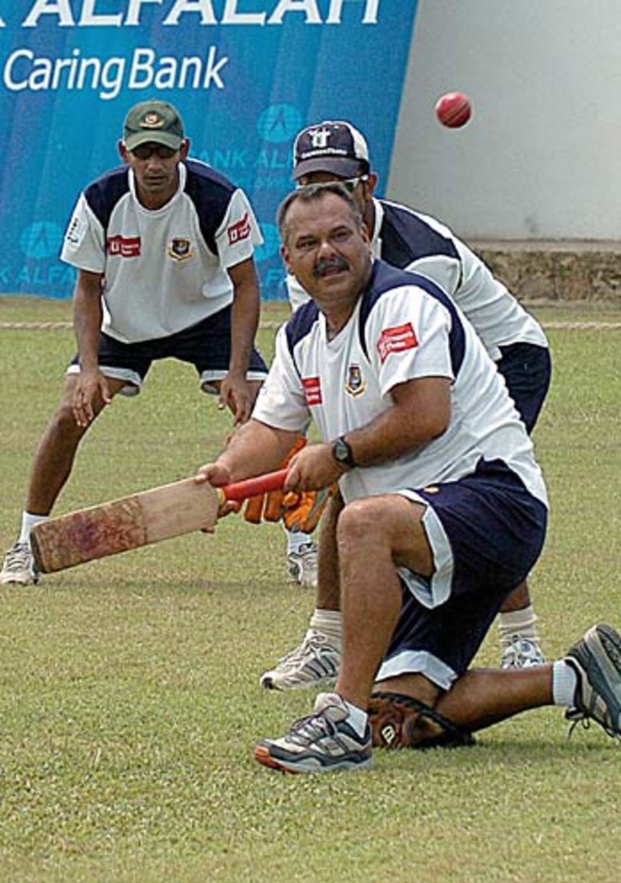 Dav Whatmore leads the fielding practice in Colombo, September 19,2005
