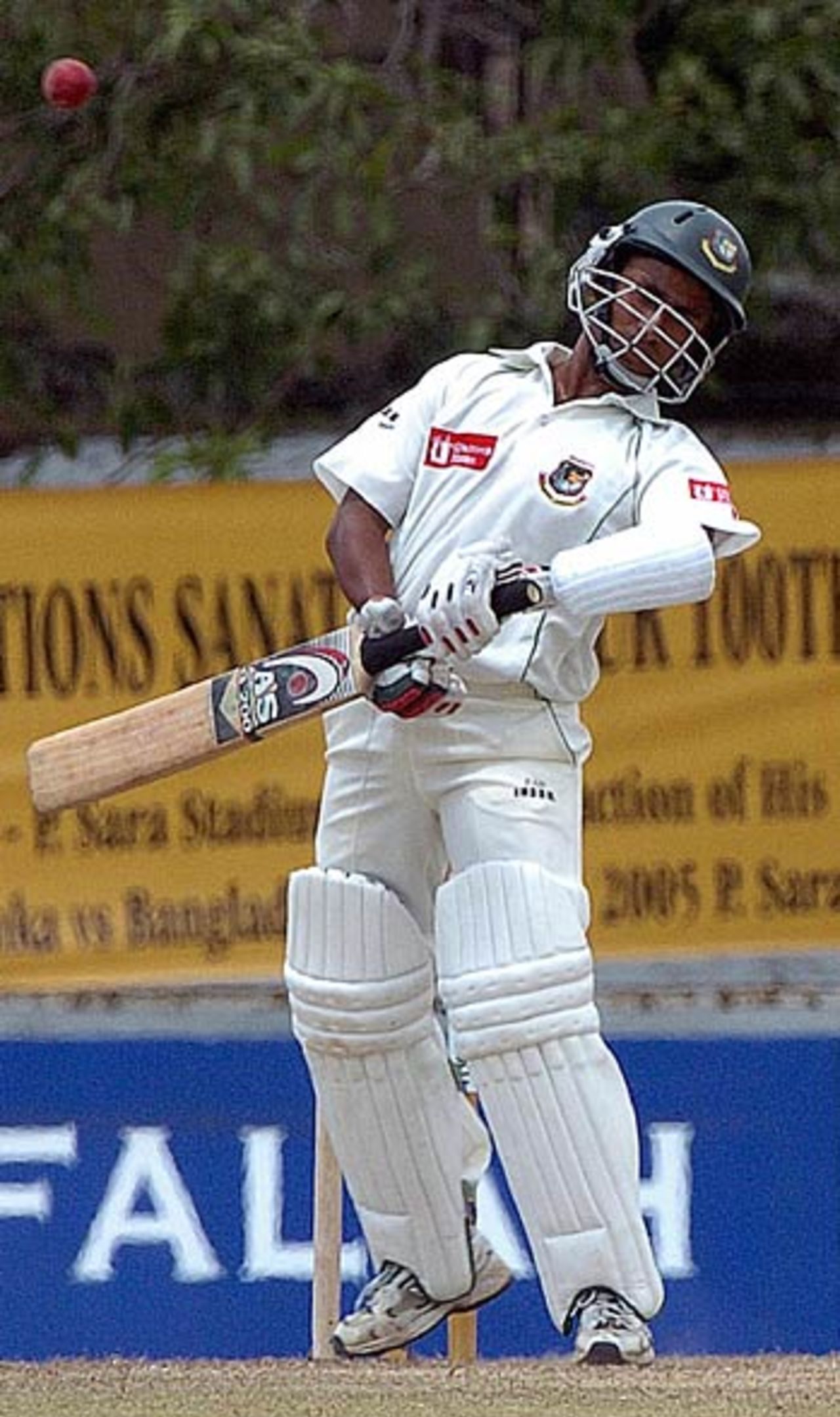 Mohammad Ashraful drops his wrists and sways away from a bouncer, Sri Lanka v Bangladesh, Colombo, September 21, 2005