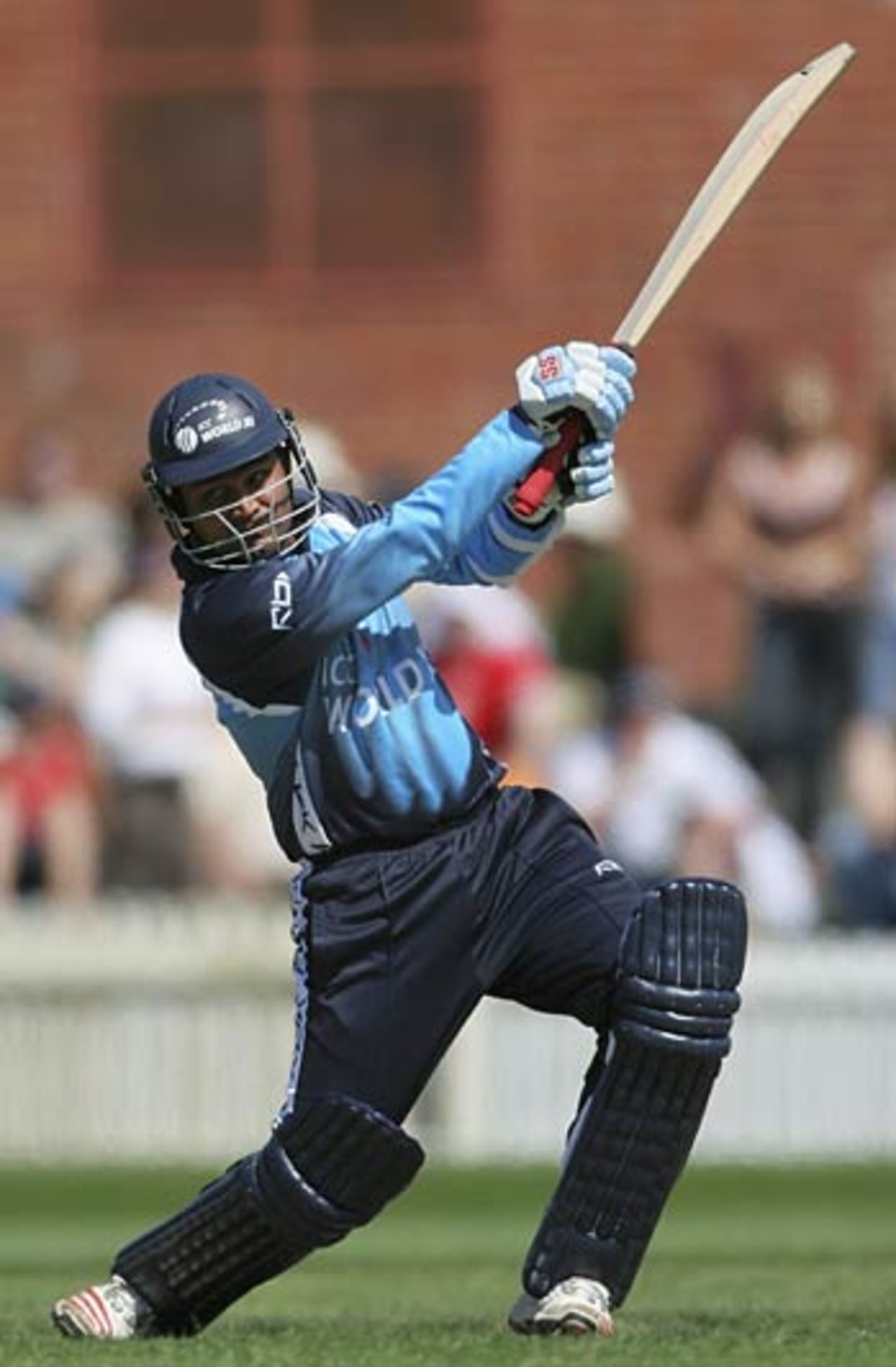 Virender Sehwag flays one through the off side, Victoria v World XI, Melbourne, October 2, 2005