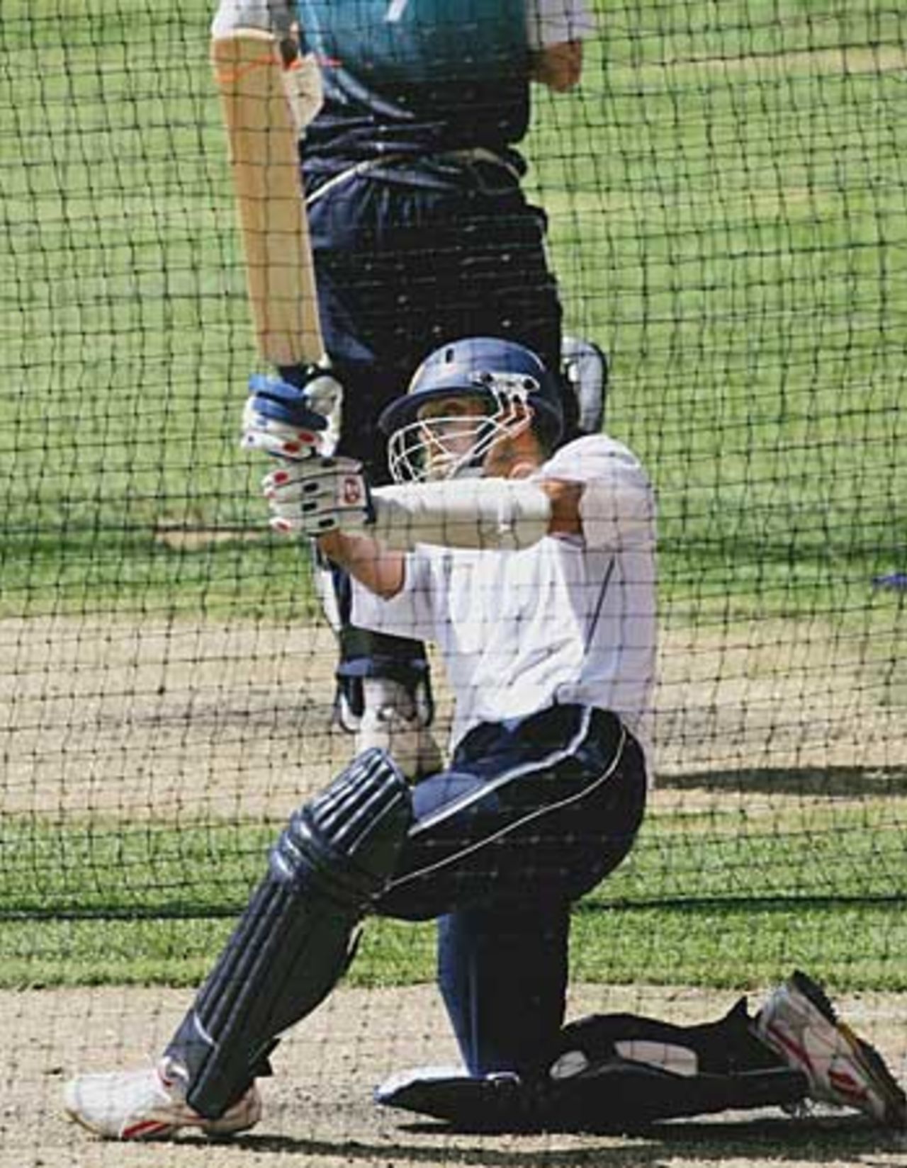 Rahul Dravid hits over the top during a training session, Melbourne, October 4, 2005