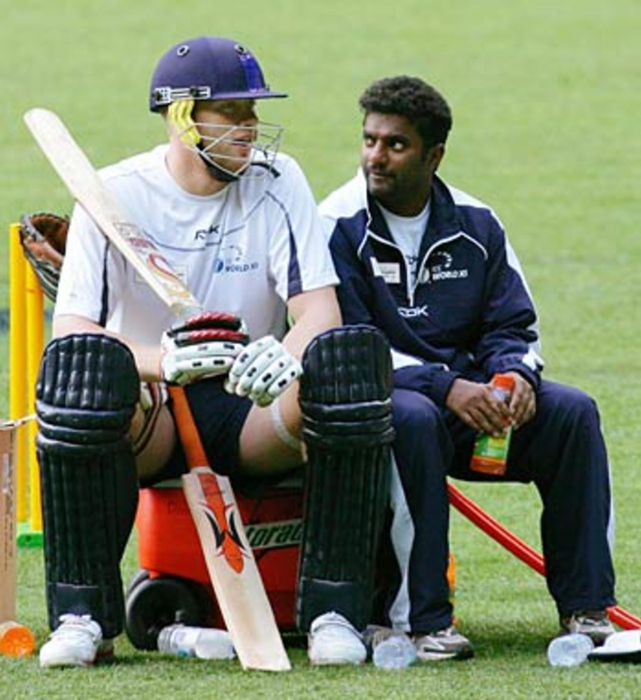Muttiah Muralitharan and Andrew Flintoff take a break from practise, Melbourne, October 6, 2005