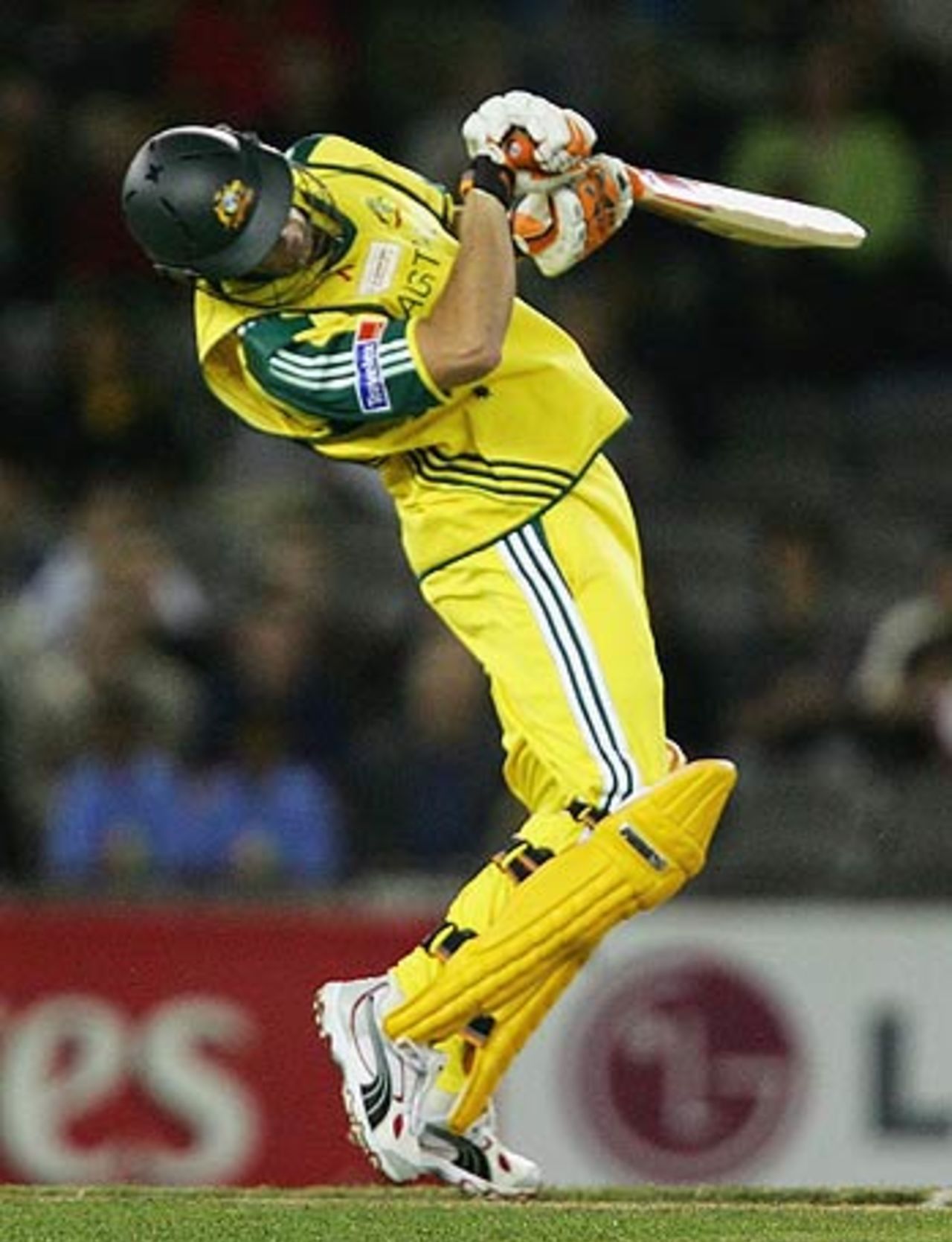 Adam Gilchrist swerves out of the way of a Shoaib Akhtar bouncer, Australia v World XI, 2nd ODI, Super Series, Melbourne, October 7, 2005