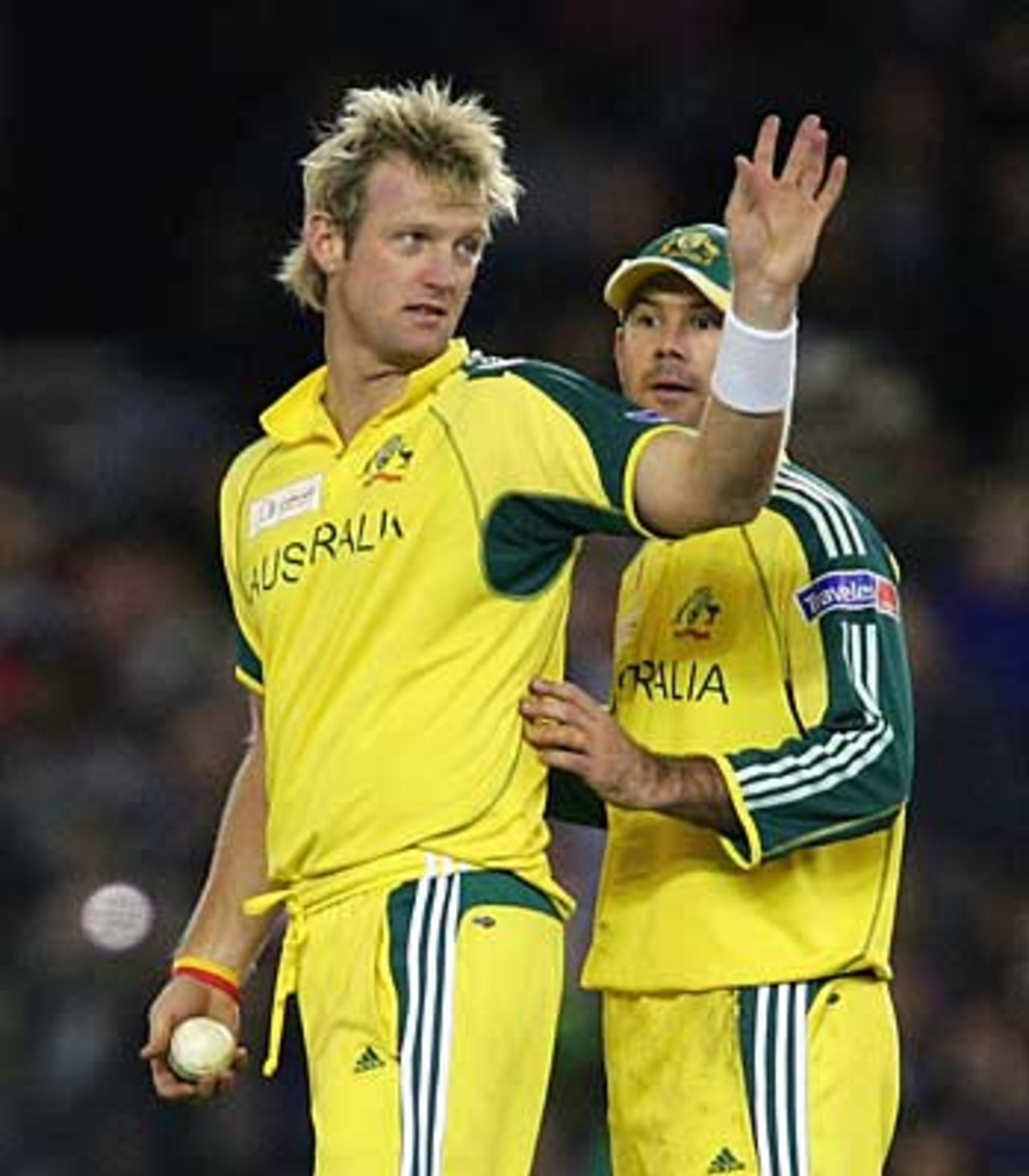 Cameron White and Ricky Ponting discuss what field to set, his first international wicket, Australia v World XI, 2nd ODI, Super Series, Melbourne, October 7, 2005