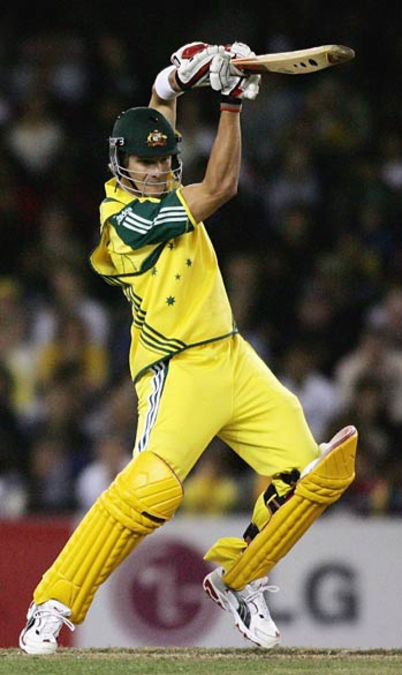 Shane Watson punches one through the off side on his way to a unbeaten 66, Australia v World XI, Melbourne, October 9, 2005