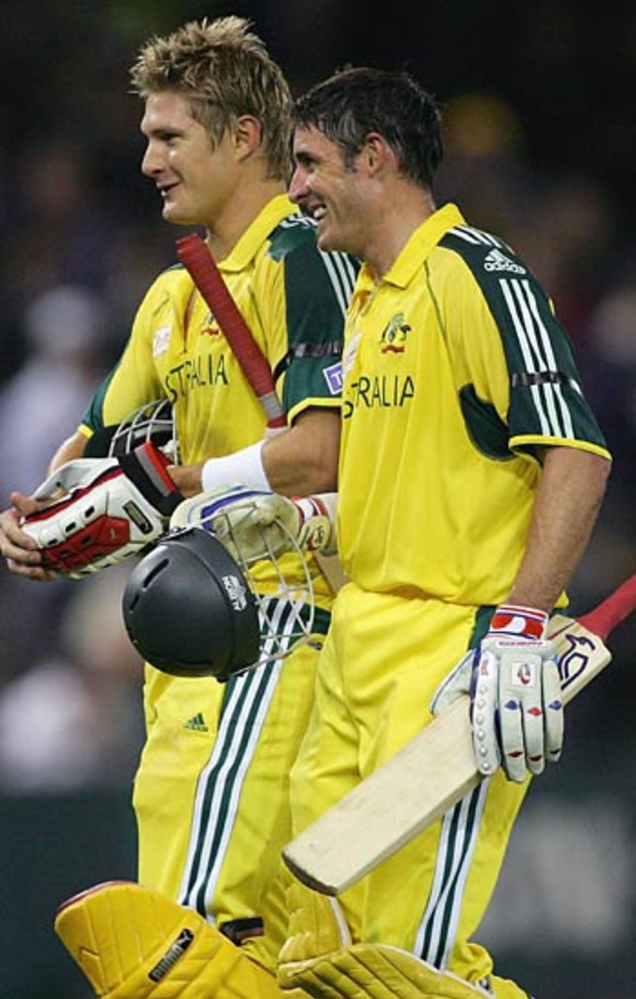 Shane Watson and Mike Hussey walk off together after a bright partnership of 145, Australia v World XI, Melbourne, October 9, 2005