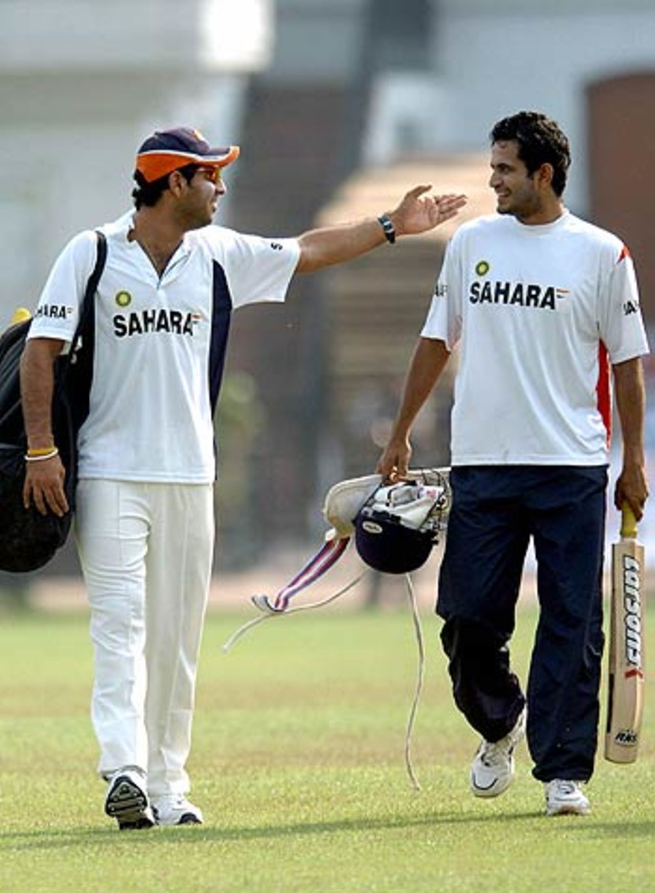 Yuvraj Singh and Irfan Pathan get ready for practice, Mohali, October 9, 2005