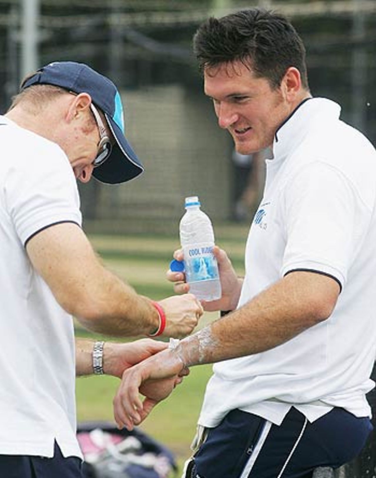 Graeme Smith receives treatment from Kirk Russell, the physio, on the eve of the Super Test, Sydney, October 13, 2005