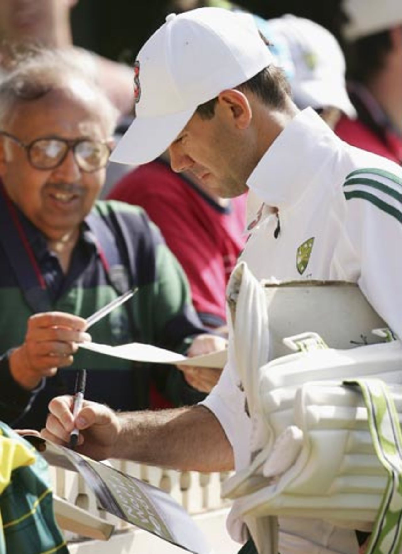 Ricky Ponting obliges autograph seekers on the eve of the Super Test, Sydney, October 13, 2005
