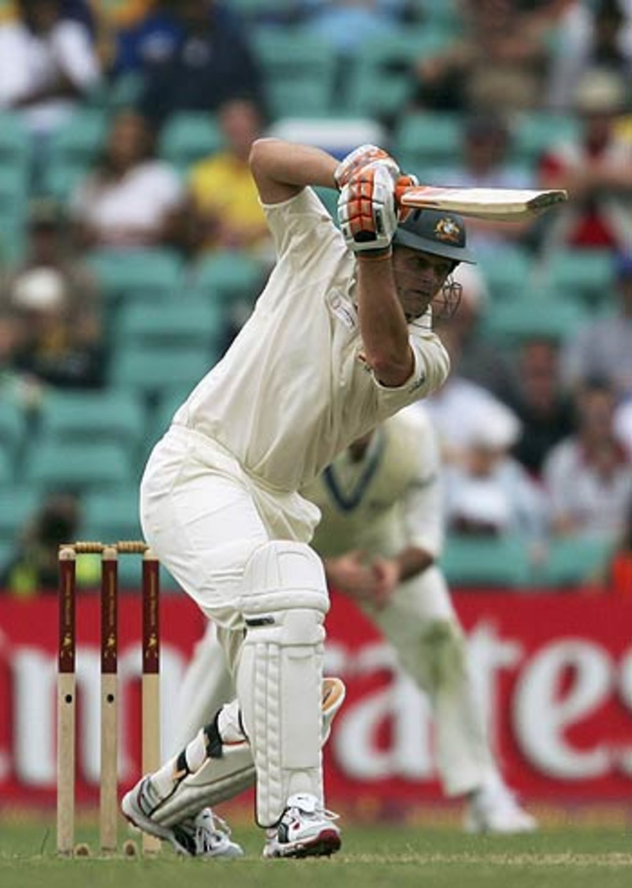 Adam Gilchrist slams one to the cover fence, Australia v World XI, Day 1, Sydney Cricket Ground, October 14, 2005