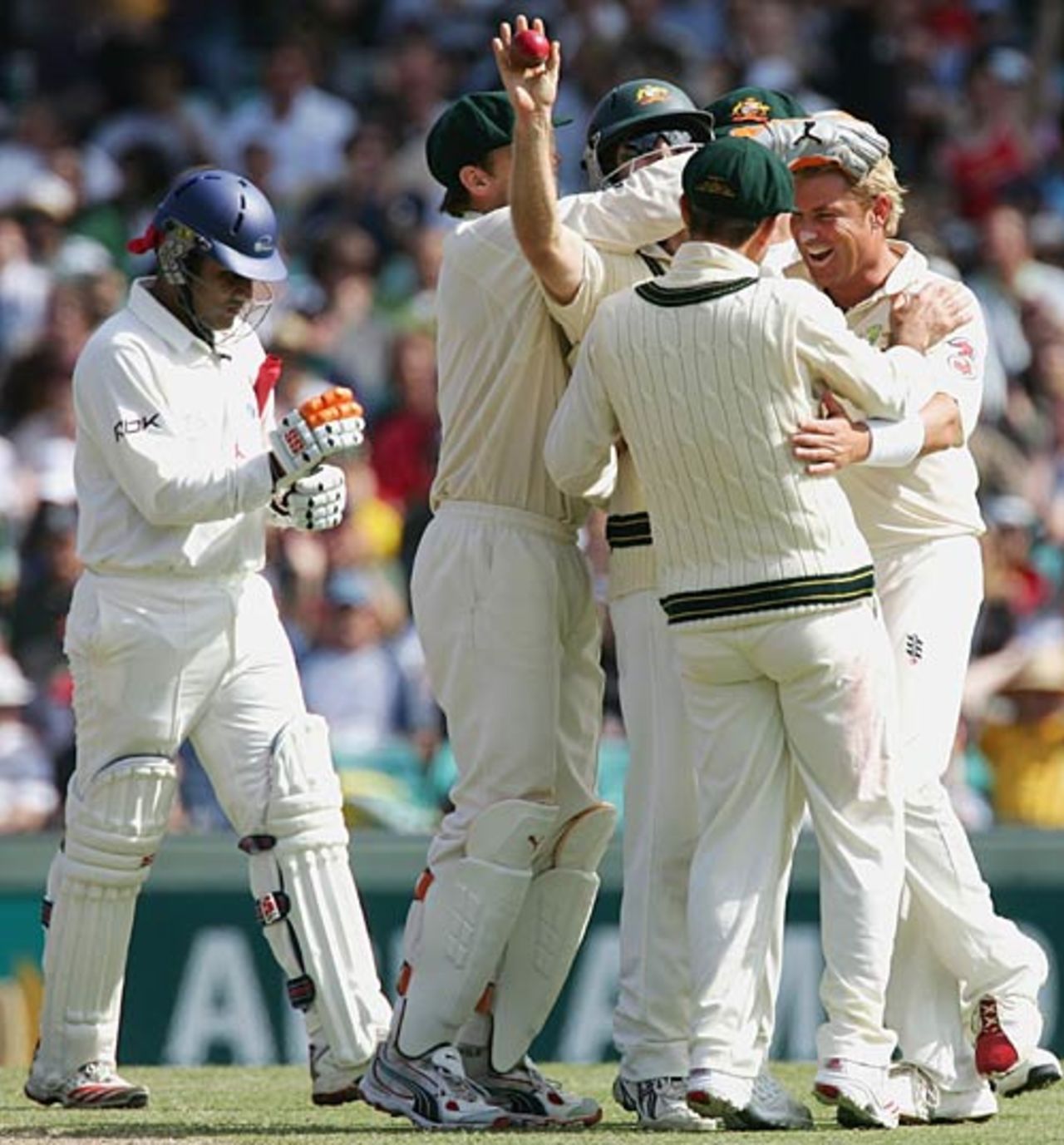 Shane Warne celebrates the wicket of Virender Sehwag with his team-mates, Australia v World XI, Super Test, 2nd Day, Sydney, October 15, 2005