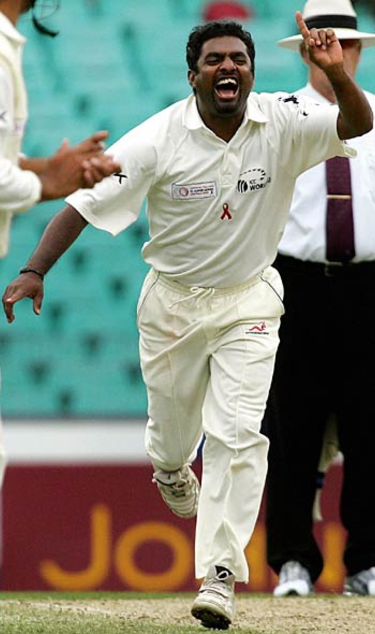 Muttiah Muralitharan turned on his magic at the SCG, dismissing Simon Katich and Adam Gilchrist in the space of seven balls, Australia v World XI, Super Test, 3rd Day, Sydney, October 16, 2005
