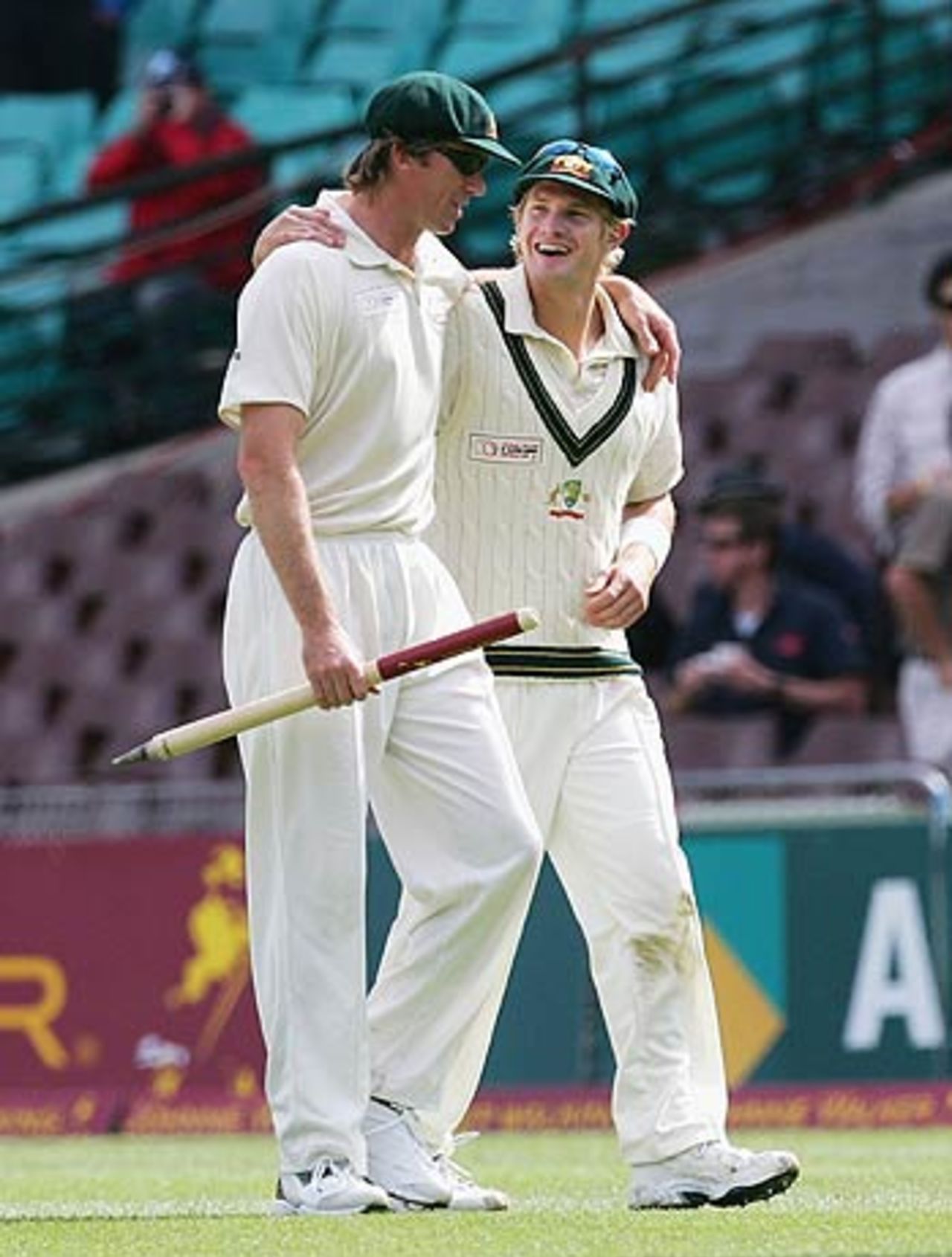 Glenn McGrath and Shane Watson troop off, Australia v World XI, Super Test, Sydney, 4th Day, October 17, 2005