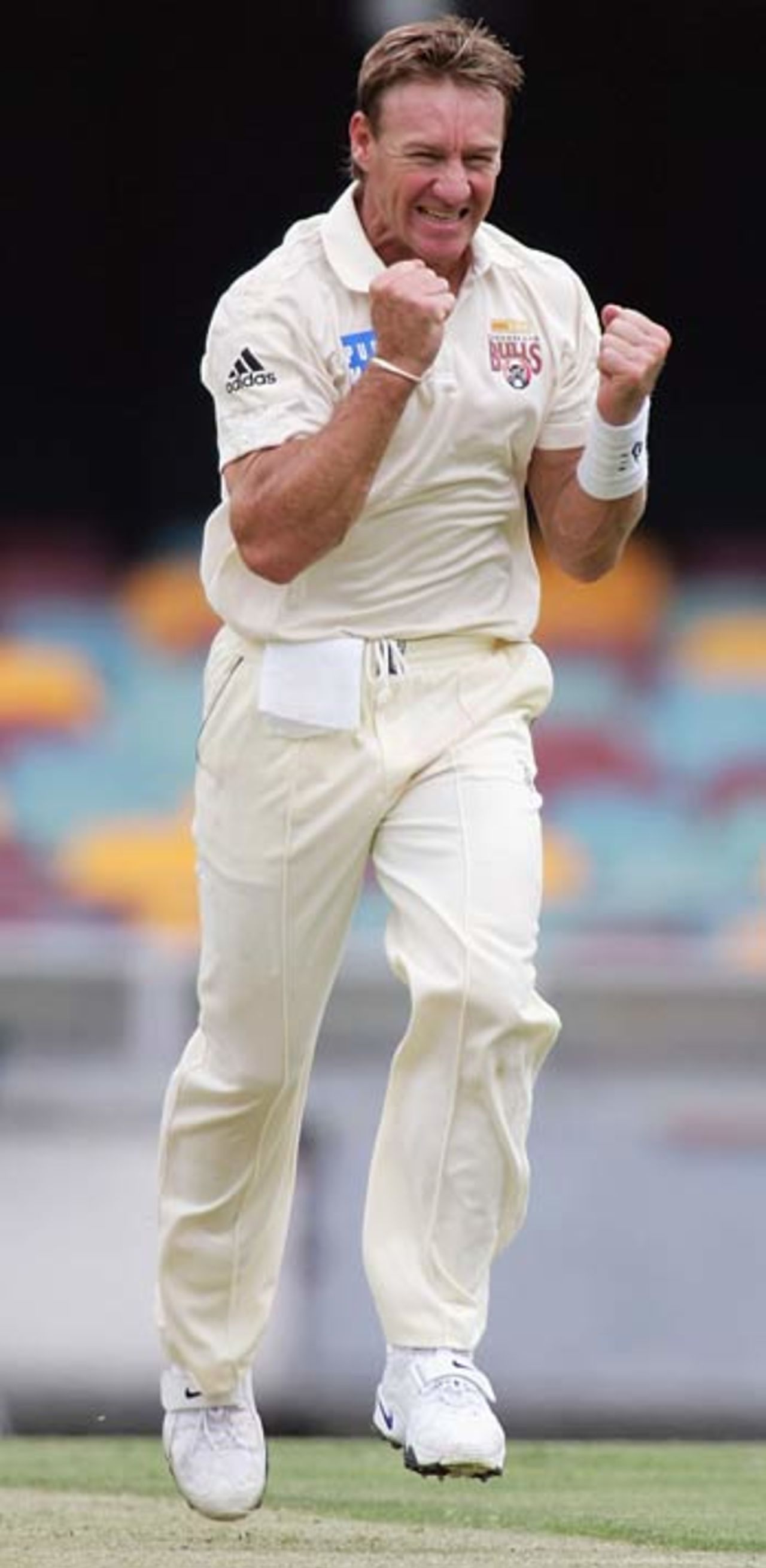 Andy Bichel celebrates one of his five wickets, Queensland v Tasmania, Pura Cup, Brisbane, October 17, 2005