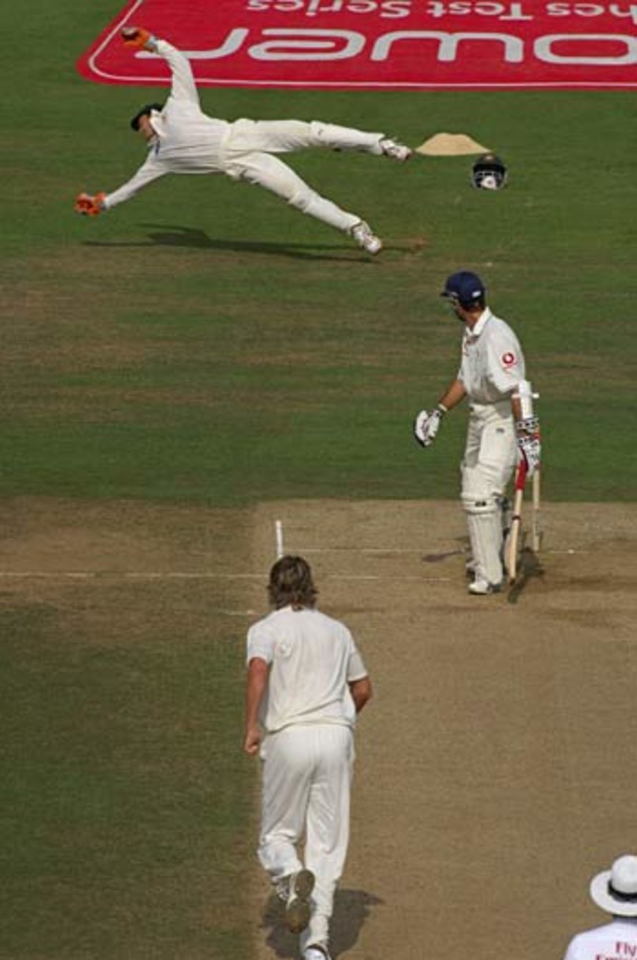 Adam Gilchrist swoops to catch Michael Vaughan, England v Australia, 5th Test, The Oval, September 12, 2005. The picture is taken from the book <I>Ashes in Focus</I> published by A&C Black