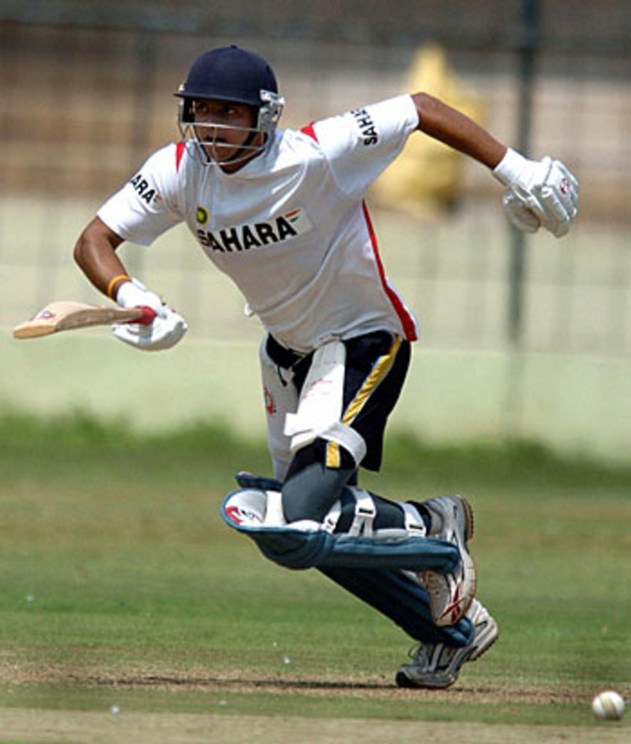 Suresh Raina sets off for a run during a practice match at the National Cricket Academy, Bangalore, October 21, 2005