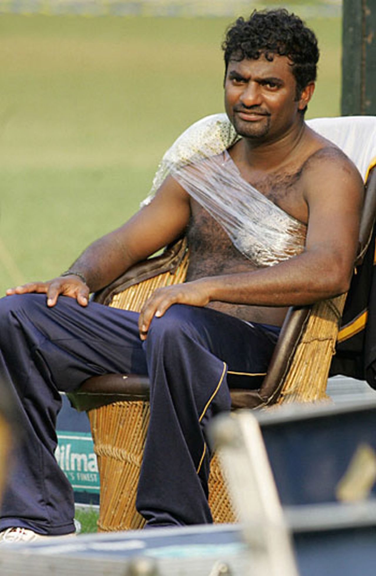 A reflective Muttiah Muralitharan with his shoulder in an ice pack, Mumbai, October 21, 2005 