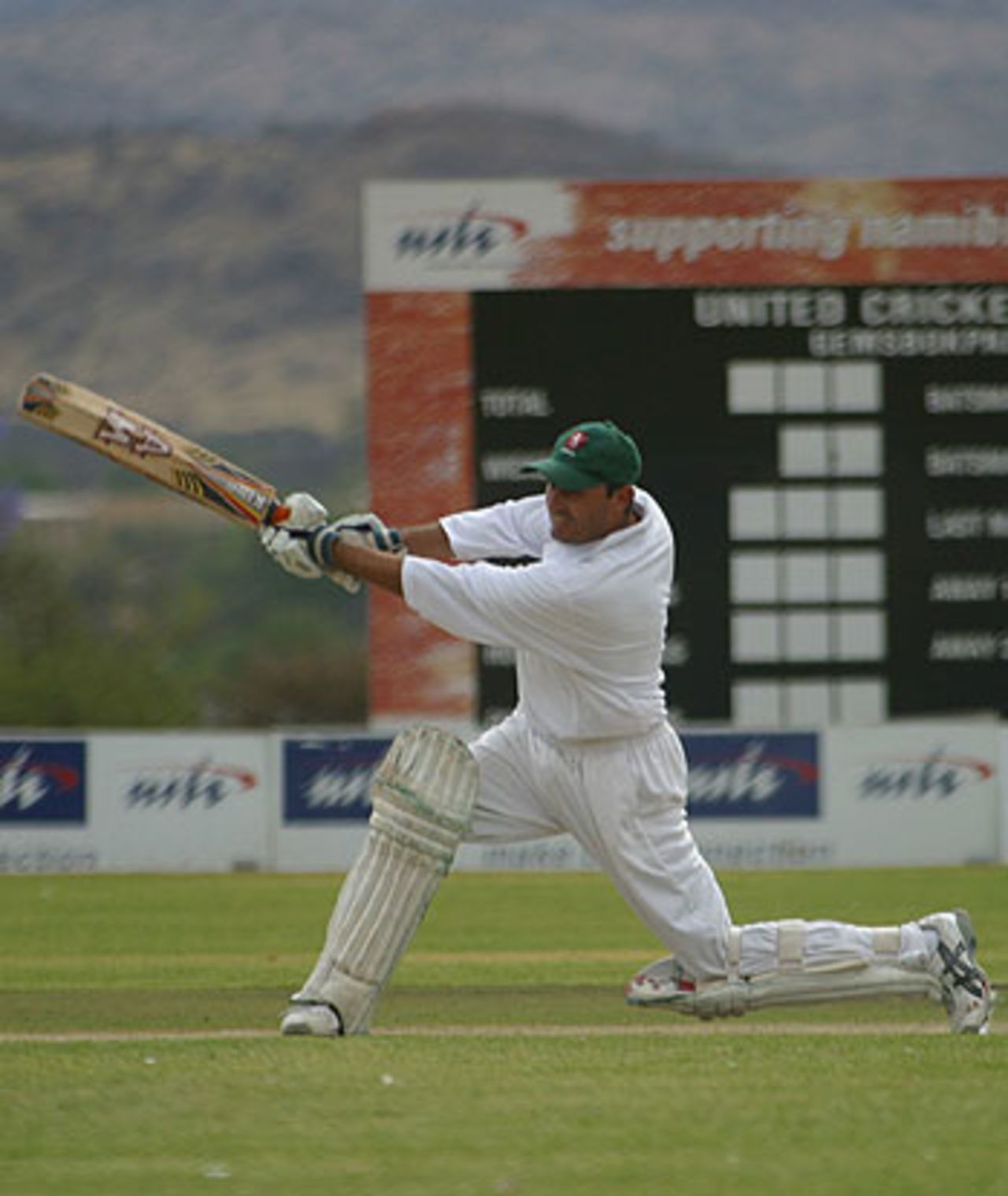 Hitesh Modi drives during Kenya's ICC Intercontinental Cup fixture against Bermuda, October 23, 2005
