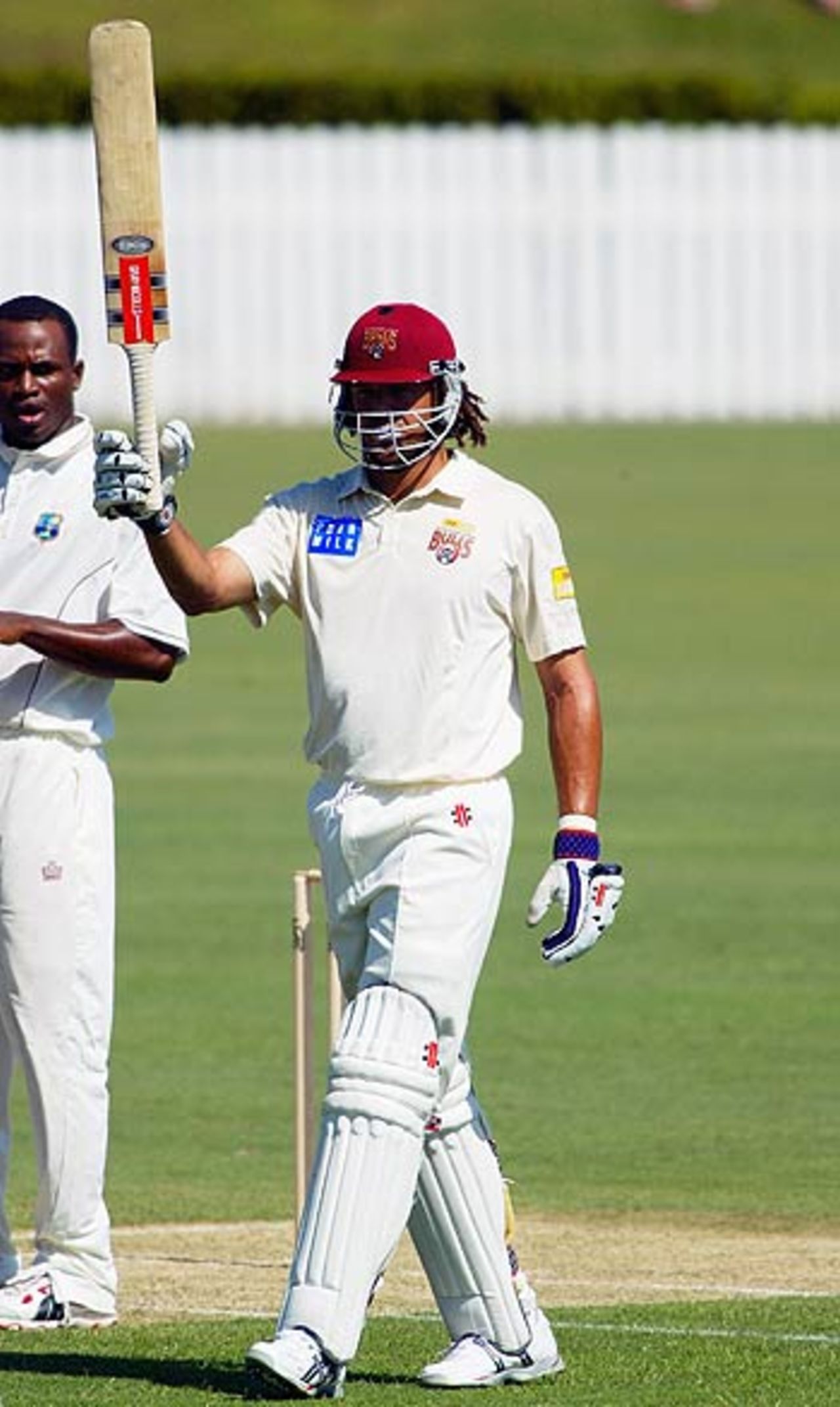Andrew Symonds celebrates his half-century, Queensland v West Indians, Alan Border Oval, Brisbane, 1st day, October 27, 2005