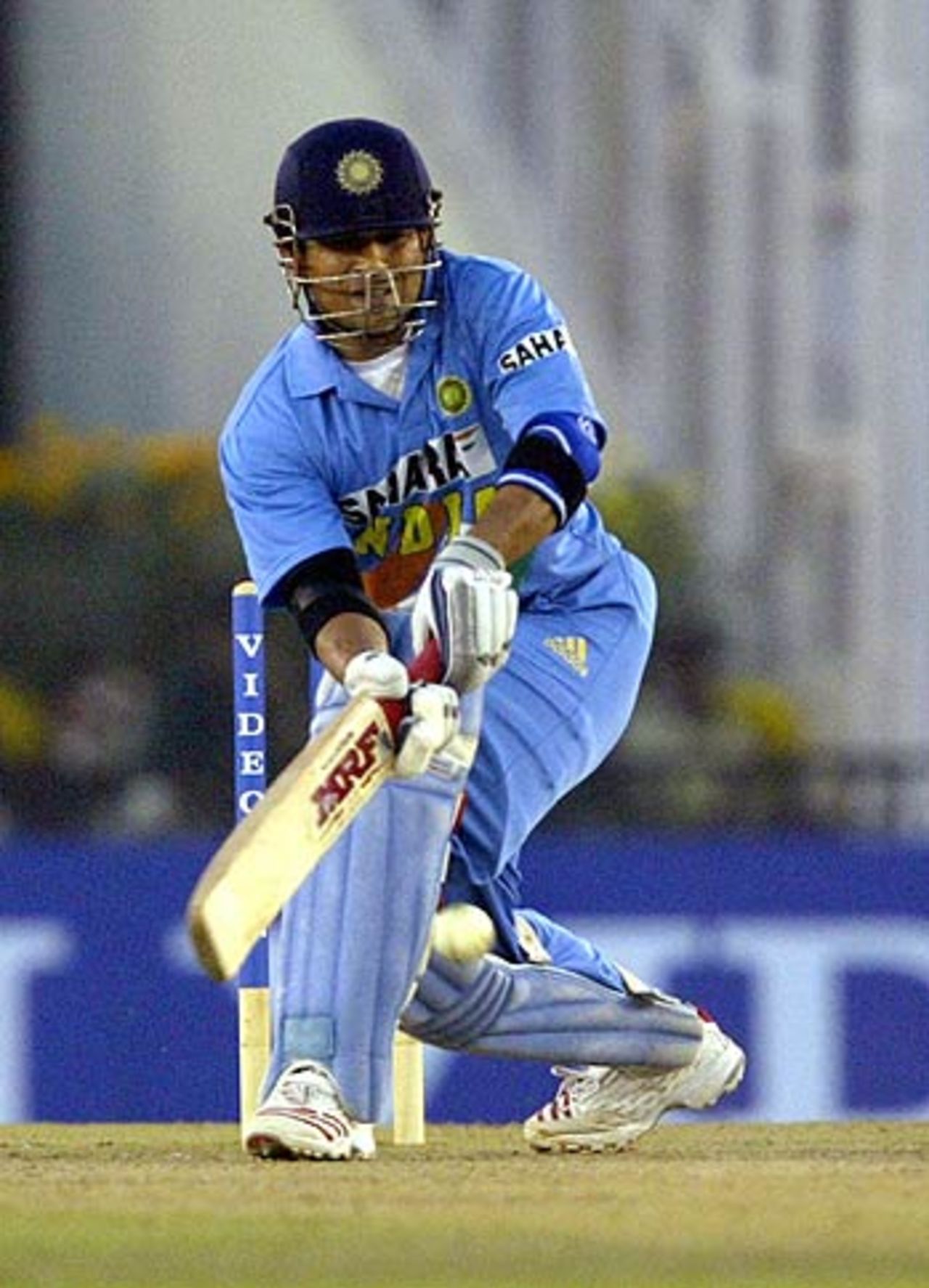 Sachin Tendulkar sweeps during his half-century, India v Sri Lanka, 2nd ODI, Mohali, October 28, 2005