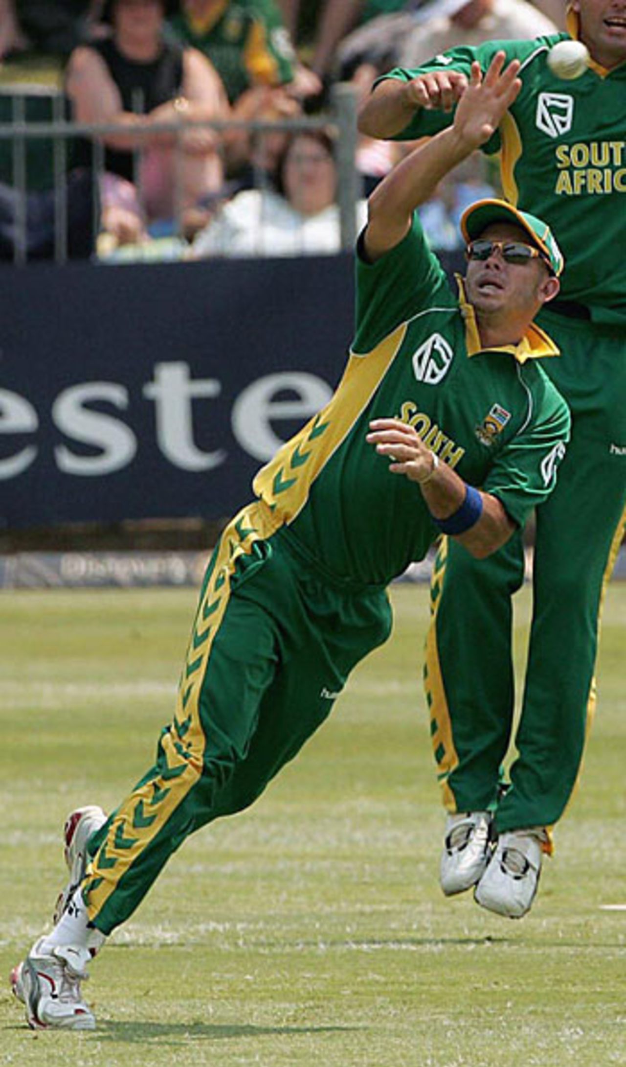 ... and Herschelle Gibbs leaps, South Africa v New Zealand, 3rd ODI, Port Elizabeth, October 30, 2005