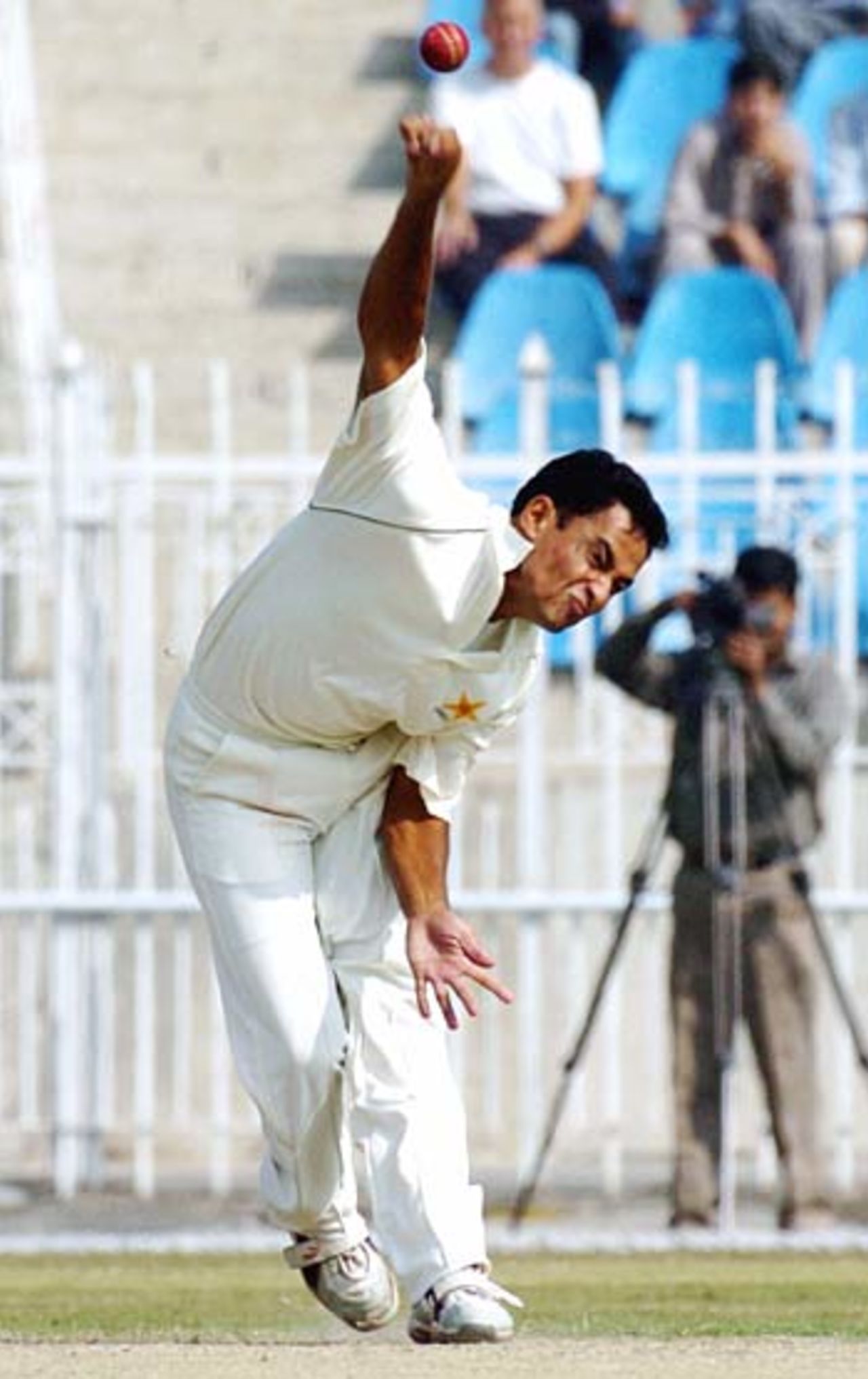 Yasir Arafat in action on his way to 5 for 31. He finished with impressive match figures of 9 for 76, Patron's XI v England XI, Rawalpindi, November 2, 2005