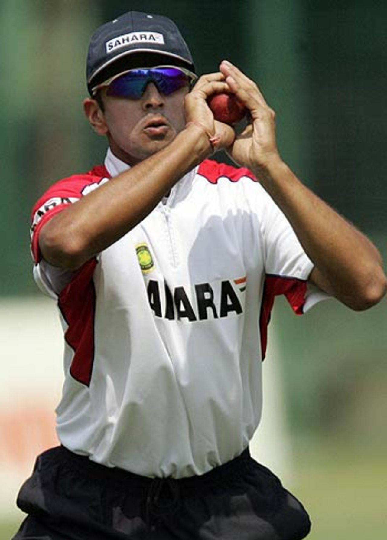 Rahul Dravid pouches a few catches ahead of the fourth ODI against Sri Lanka, Nehru Stadium, Pune, November 2, 2005