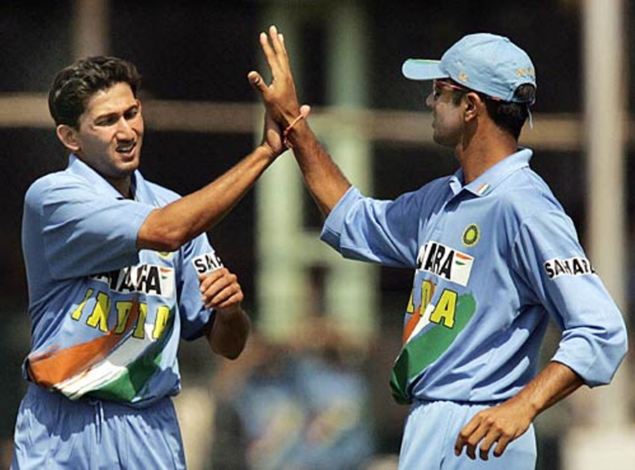 Rahul Dravid congratulates Ajit Agarkar on his five-wicket haul during the fourth ODI, India v Sri Lanka, 4th ODI,  Pune