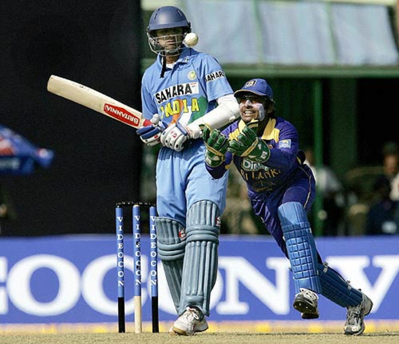 Rahul Dravid looks on as Kumar Sangakkara dives for a catch, India v Sri Lanka, 4th ODI,  Pune