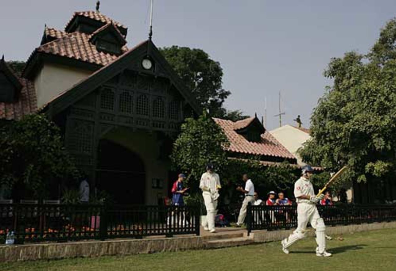 Andrew Strauss and Marcus Trescothick head out to open the batting at the Bagh-e-Jinnah ground, Pakistan A v England XI, Tour Match, Lahore, November 6, 2005