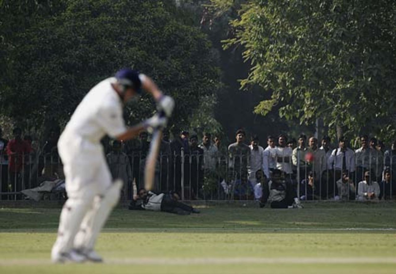 Locals watch from behind the fence as Ashley Giles bats, Pakistan A v England XI, Tour Match, Lahore, November 7, 2005