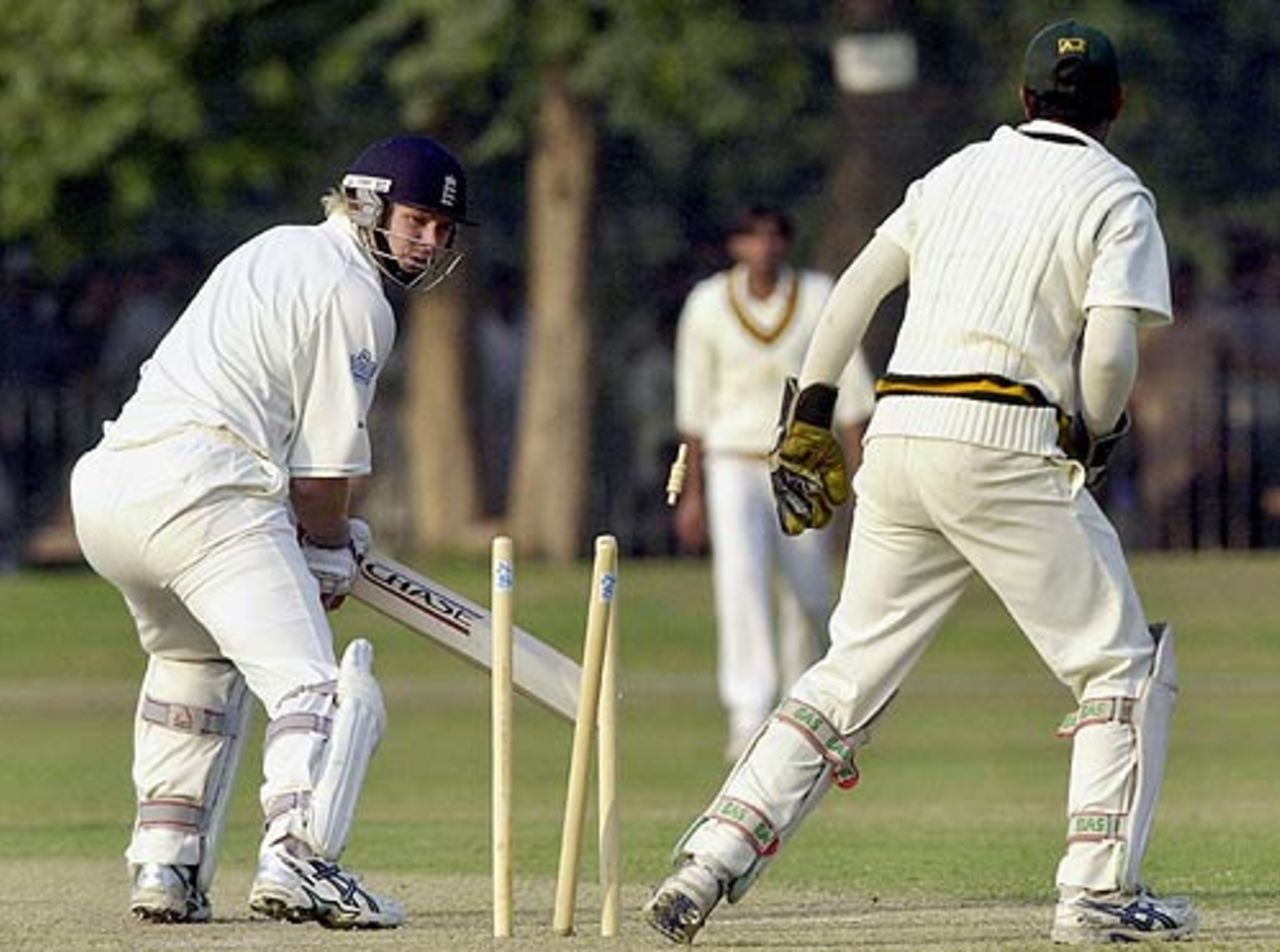 Matthew Hoggard looks back to see his stumps disturbed, Pakistan A v England XI, Tour Match, Lahore, November 7, 2005